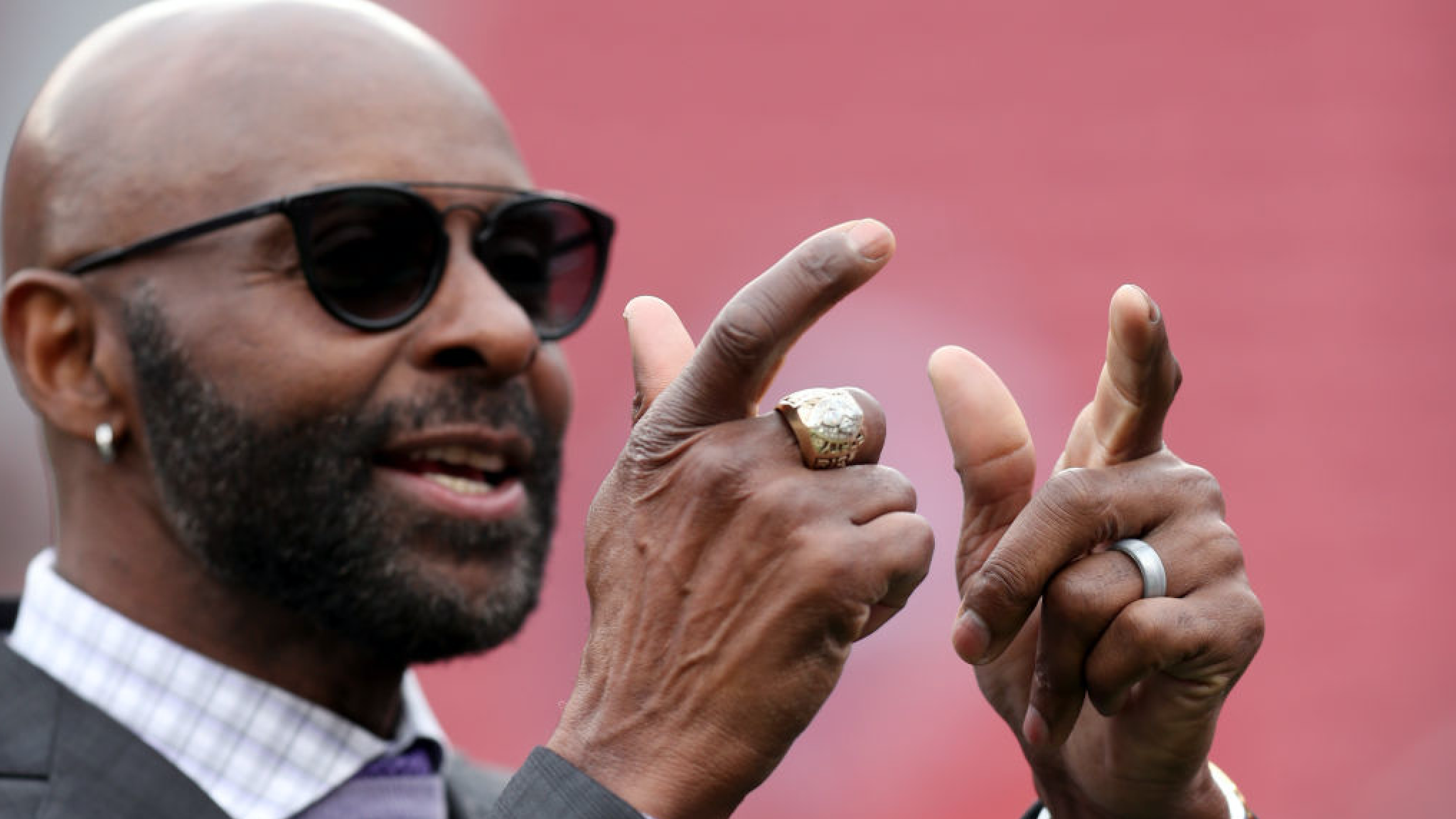 Former San Francisco 49ers wide receiver Jerry Rice -with one of this his Super Bowl rings- gestures before the San Francisco 49ers take on Green Bay Packers in their NFC Championship game at Levi's Stadium in Santa Clara, Calif., on Sunday, Jan. 19, 2020.
