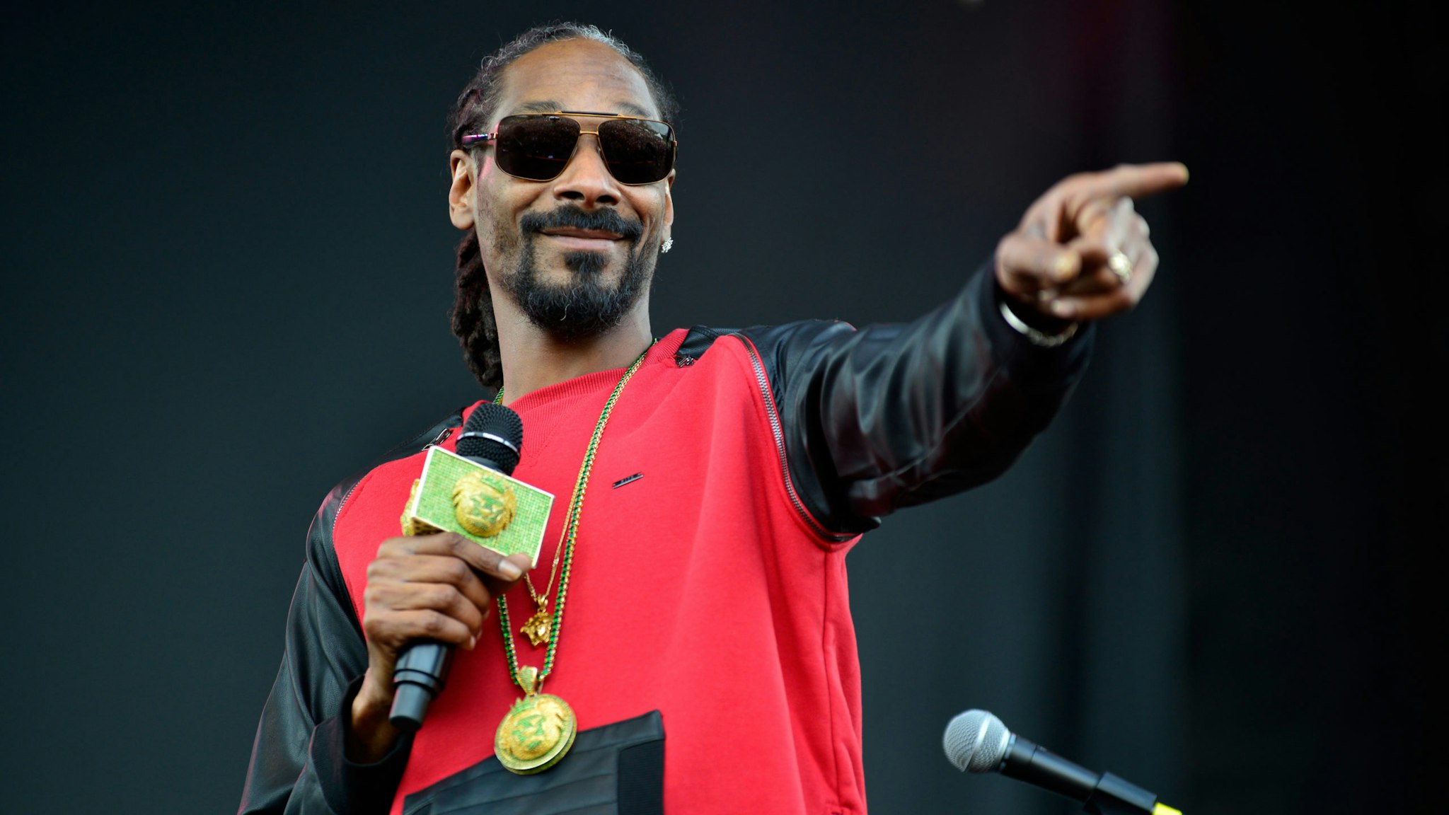 AUSTIN, TX - MARCH 15: Snoop Dogg performs onstage at the SXSW Outdoor Stage at Butler Park during the 2014 SXSW Music, Film + Interactive Festival at Butler Park on March 15, 2014 in Austin, Texas.