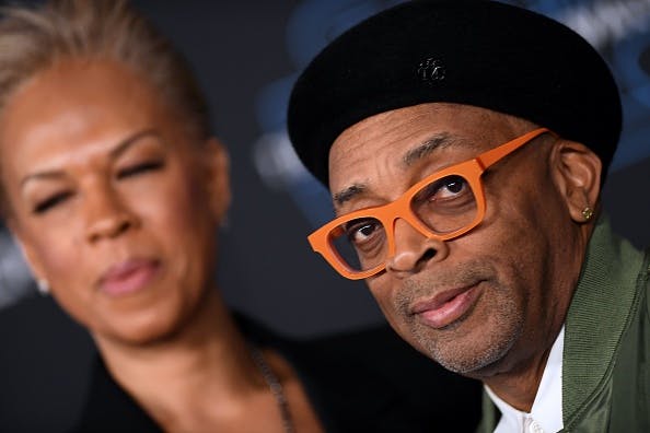 US film director Spike Lee (R) and wife Tonya Lewis Lee arrive for the world premiere of Disney's "Star Wars: Rise of Skywalker" at the TCL Chinese Theatre in Hollywood, California on December 16, 2019.