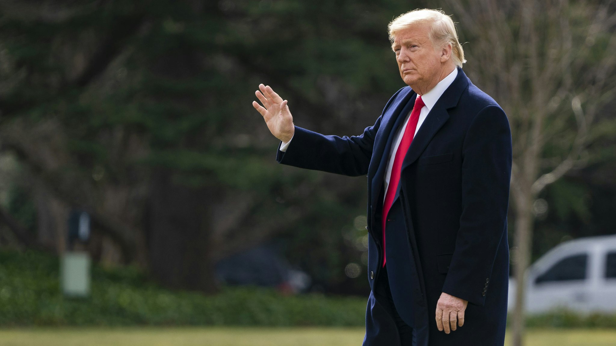 U.S. President Donald Trump gestures while walking across the South Lawn of the White House to board Marine One in Washington, D.C., U.S. on Thursday, Jan. 30, 2020. Senate Republicans say they're growing confident that they have the votes to block testimony from new witnesses in Trump's impeachment trial and acquit the president as early as Friday.
