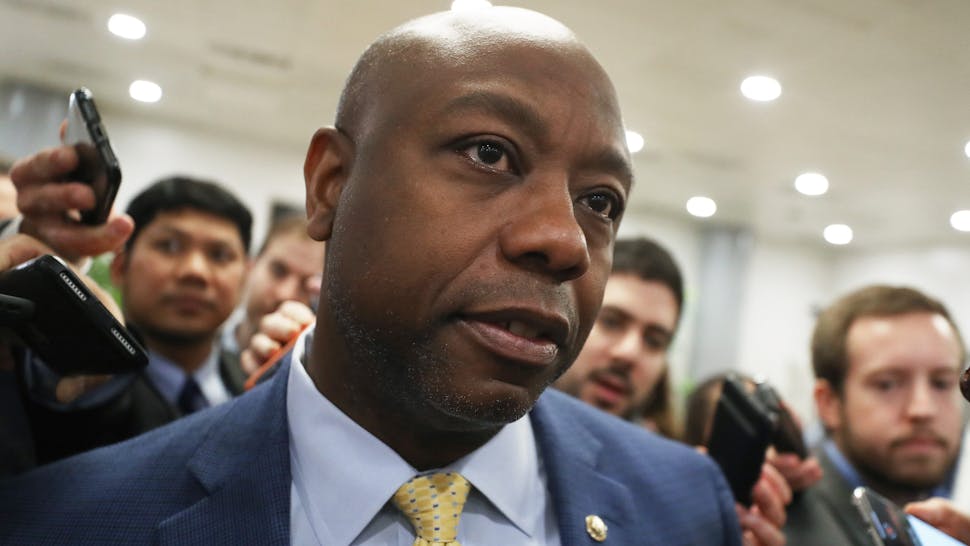 Senate Impeachment Trial Of President Trump Continues WASHINGTON, DC - JANUARY 31: Sen. Tim Scott (R-SC) speaks to reporters as he arrives at the U.S. Capitol as the Senate impeachment trial of U.S. President Donald Trump continues on January 31, 2020 in Washington, DC. Senators are expected to vote on whether to allow witnesses to testify in the trial today.