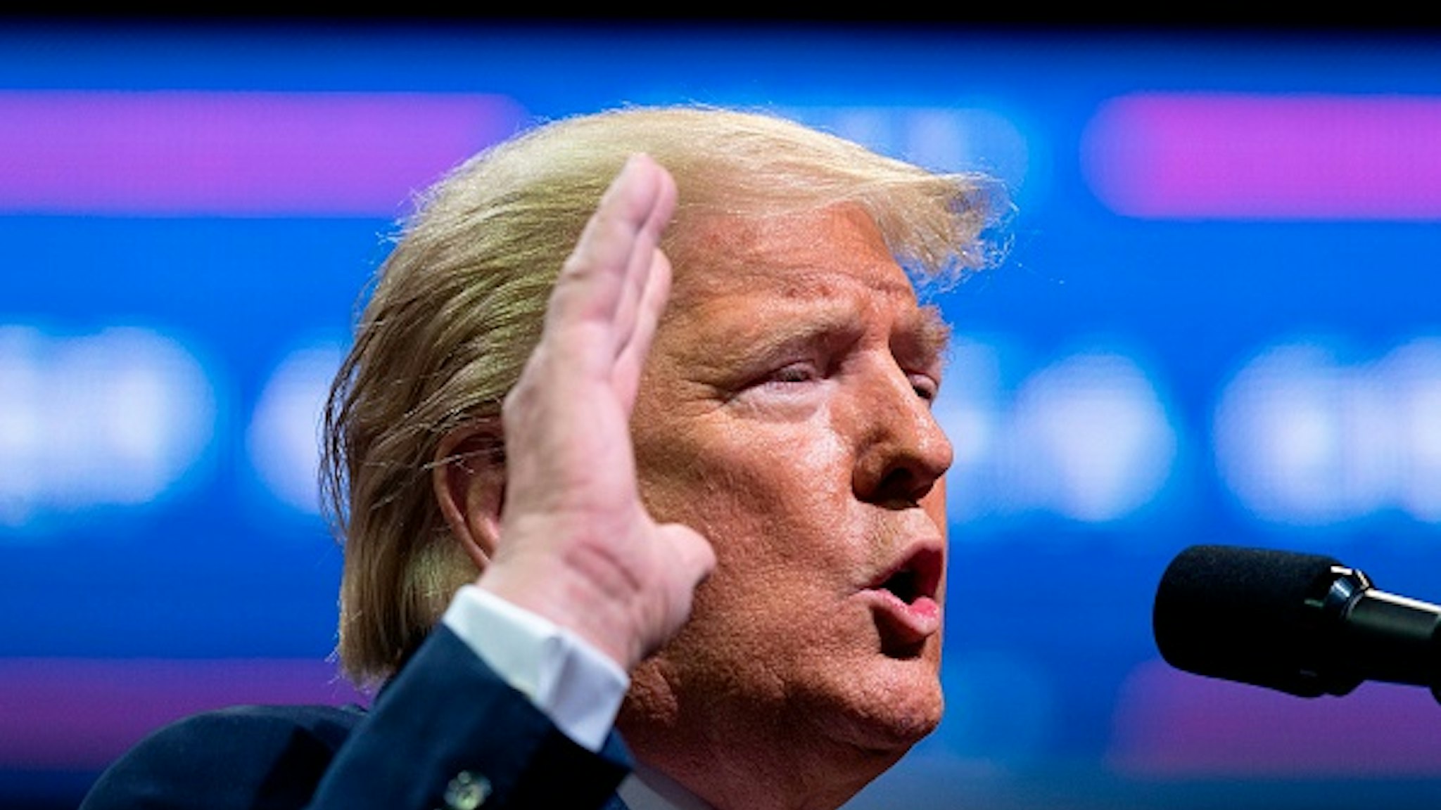 US President Donald Trump gestures as he addresses a "Keep America Great" rally in Colorado Springs, Colorado, on February 20, 2020.