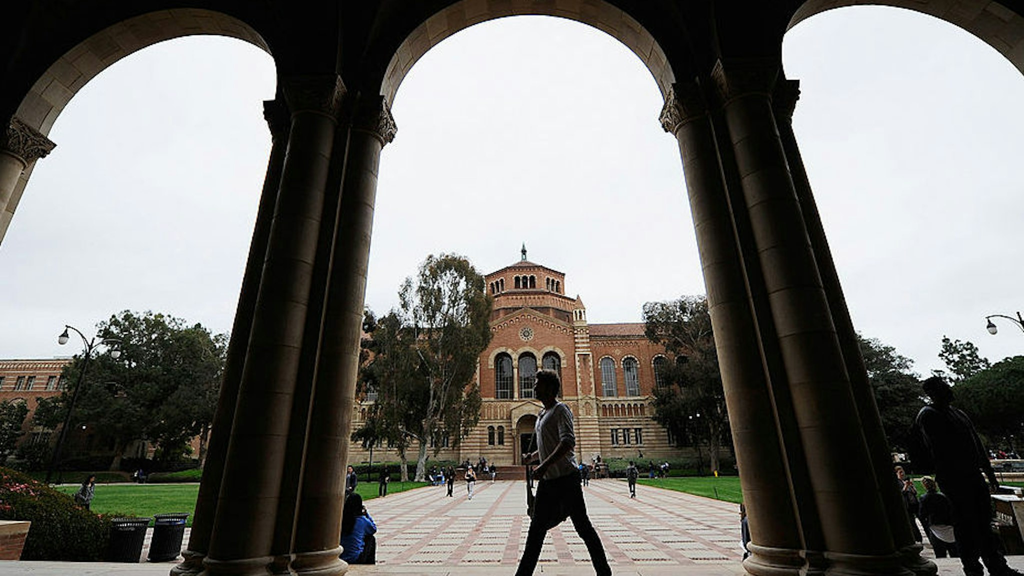 LOS ANGELES, CA - APRIL 23: A student walks near Royce Hall on the campus of UCLA on April 23, 2012 in Los Angeles, California. According to reports, half of recent college graduates with bachelor's degrees are finding themselves underemployed or jobless.