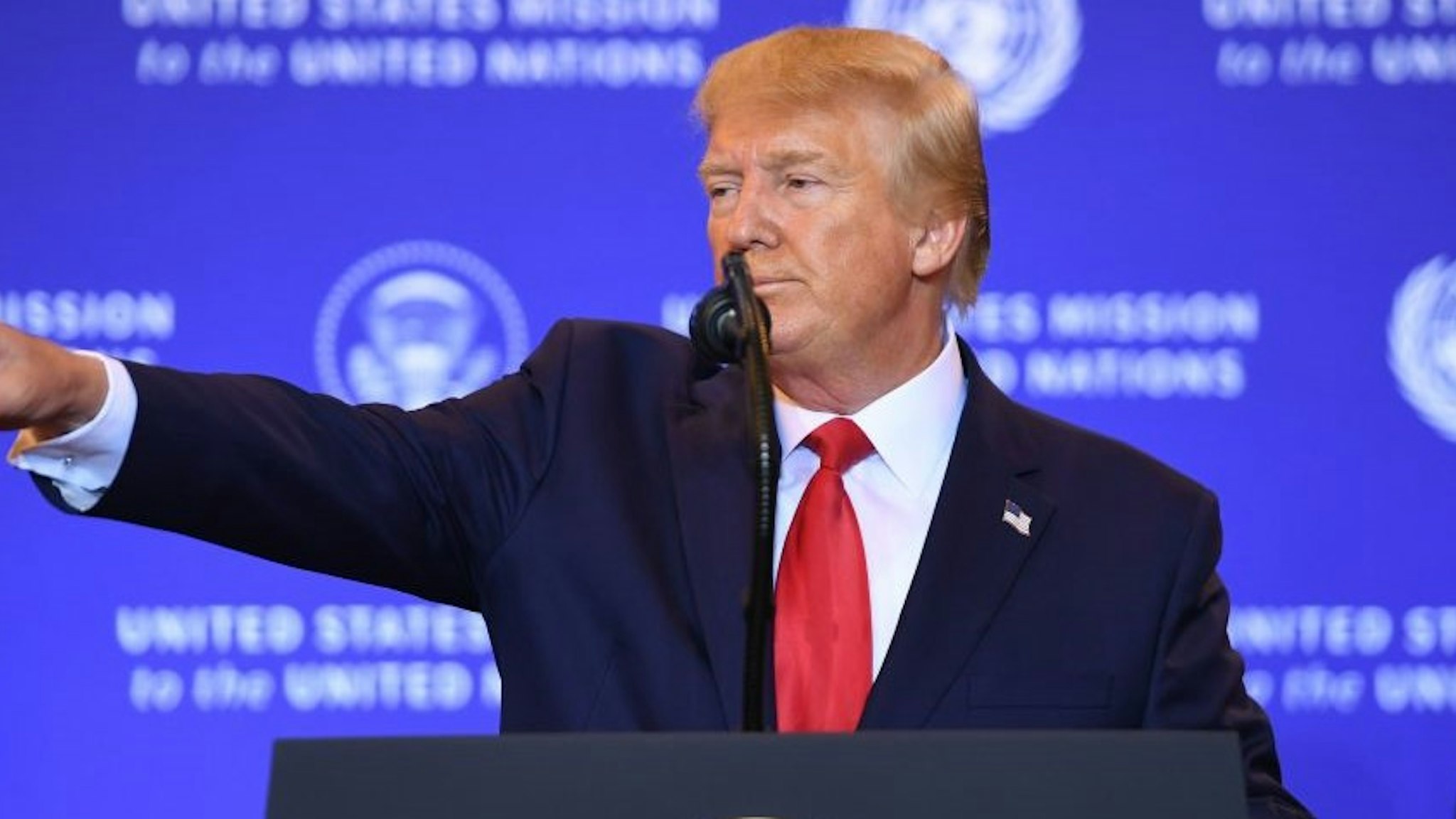 US President Donald Trump takes a question during a press conference in New York, September 25, 2019, on the sidelines of the United Nations General Assembly. - Trump said Wednesday he encouraged India and Pakistan to work out their differences in separate meetings with their prime ministers this week. "I said, 'Fellas, work it out. Just work it out,'" Trump told a news conference after attending the UN General Assembly. (Photo by SAUL LOEB / AFP) (Photo by