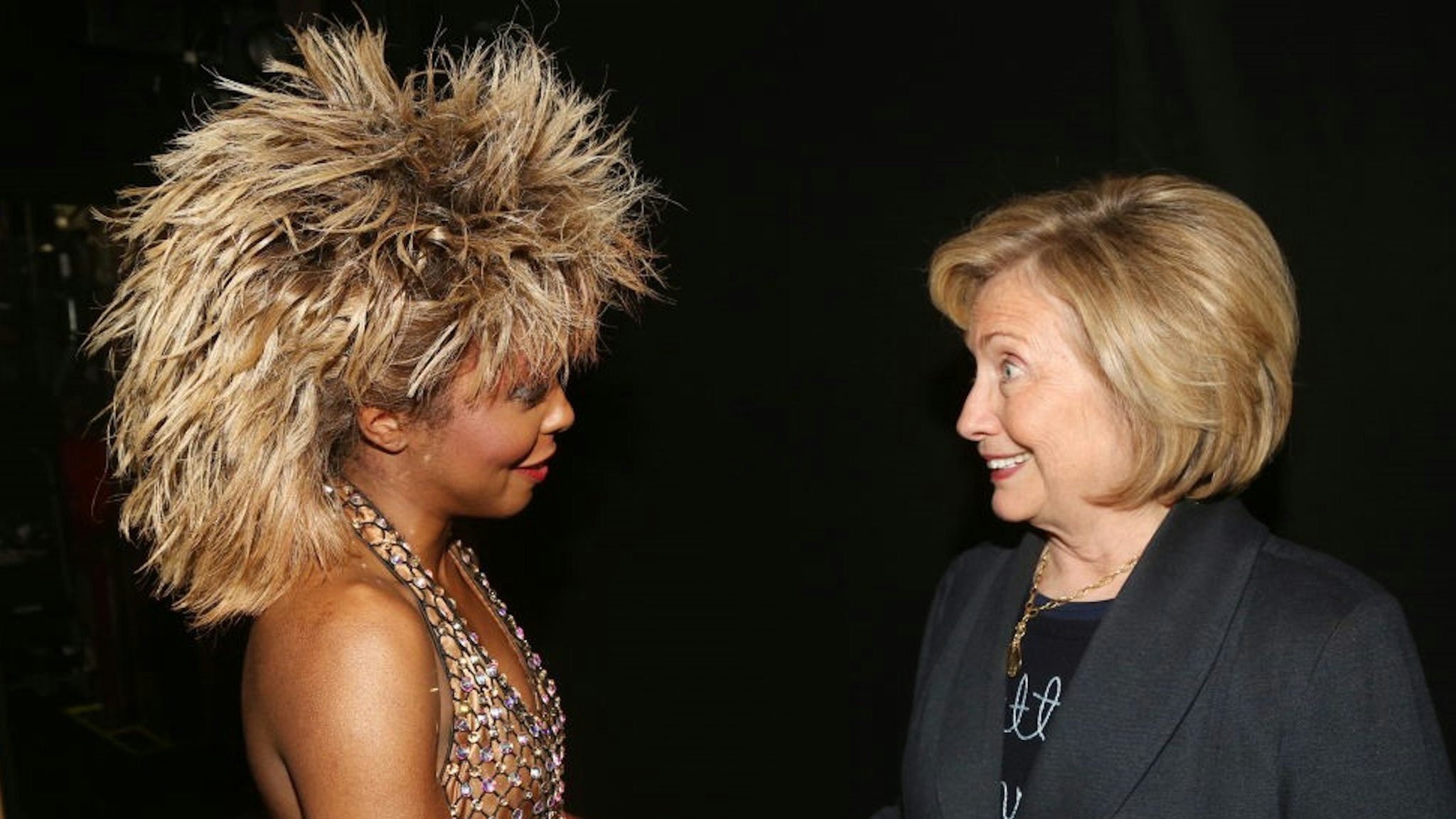 NEW YORK, NEW YORK - JANUARY 30: (EXCLUSIVE COVERAGE) Adrienne Warren as "Tina Turner" and Hillary Clinton chat backstage at the hit musical "TINA – The Tina Turner Musical" on Broadway at The Lunt Fontanne Theatre on January 30, 2020 in New York City. (Photo by