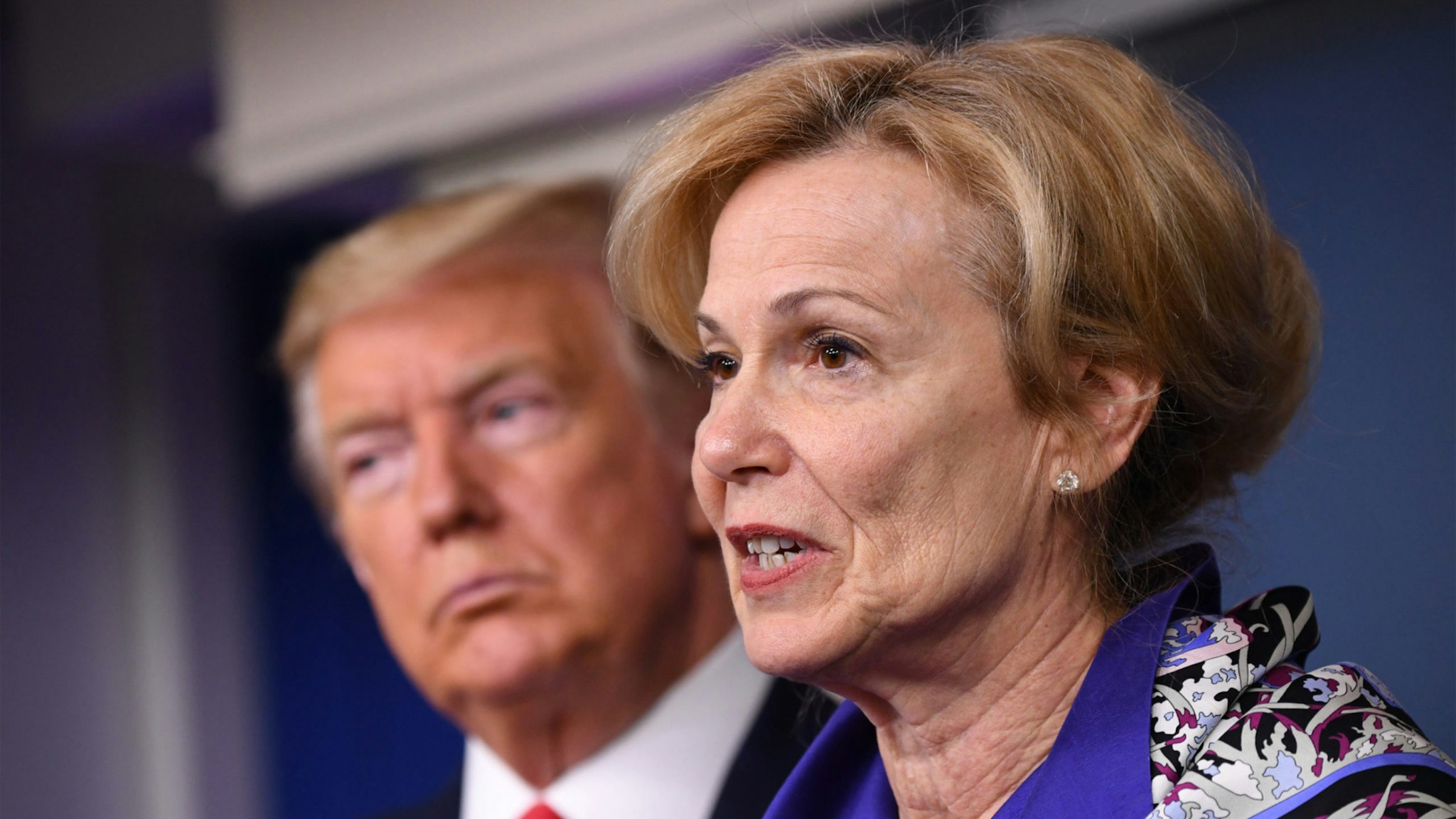 Deborah Birx, coronavirus response coordinator, speaks while U.S. President Donald Trump, left, listens during a Coronavirus Task Force news conference in the briefing room of the White House in Washington, D.C., U.S., on Wednesday, March 18, 2020.
