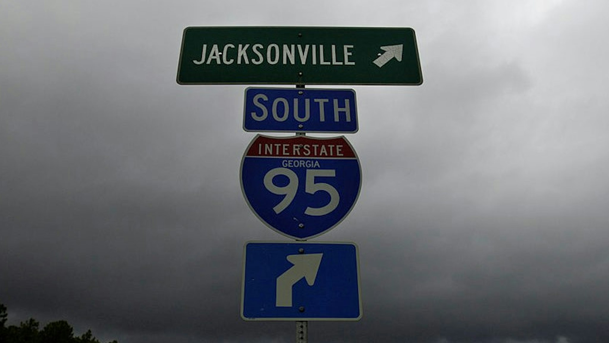 ST. MARYS GA - AUGUST 23: The interstate sign on I-95 directs the way south to Florida and the rain bans of Tropical Storm Fay August 23, 2008 in St. Marys, Georgia. Rain bans still pass through the drenched state dousing some area with more than 26 inches of rain and over 60 miles per hour winds over the past six days. (Photo b
