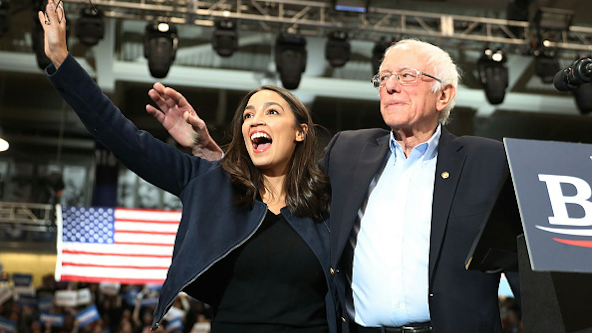 DURHAM, NEW HAMPSHIRE - FEBRUARY 10: U.S. Rep. Alexandria Ocasio-Cortez (D-N.Y) and Democratic presidential candidate Sen. Bernie Sanders (I-VT) stand together during his campaign event at the Whittemore Center Arena on February 10, 2020 in Durham, New Hampshire. The state's Democratic primary is tomorrow.