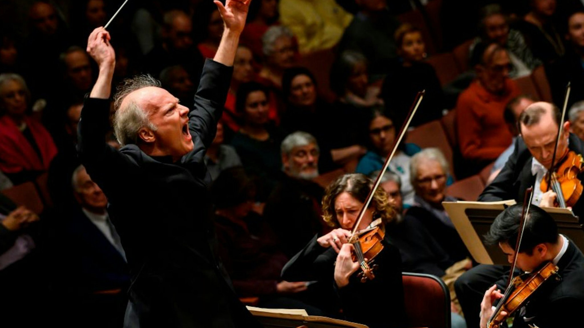 Italian conductor Gianandrea Noseda conducts the National Symphony Orchestra (NSO) during a concert at the John F. Kennedy Center for the Performing Arts in Washington DC, on February 14, 2019.