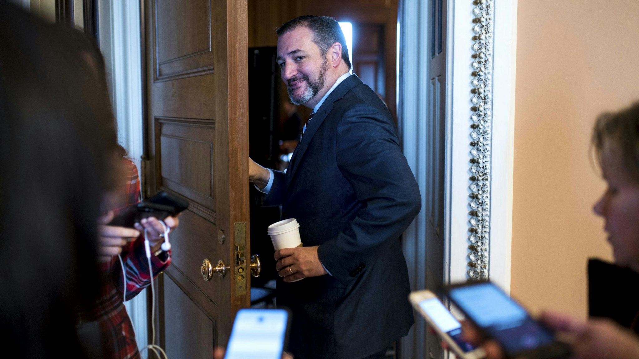 UNITED STATES - JANUARY 31: Sen. Ted Cruz, R-Texas, enters the Mansfield room for the Senate Republicans lunch in the Capitol before the start of the Senate impeachment trial proceedings on Friday, Jan. 31, 2020.