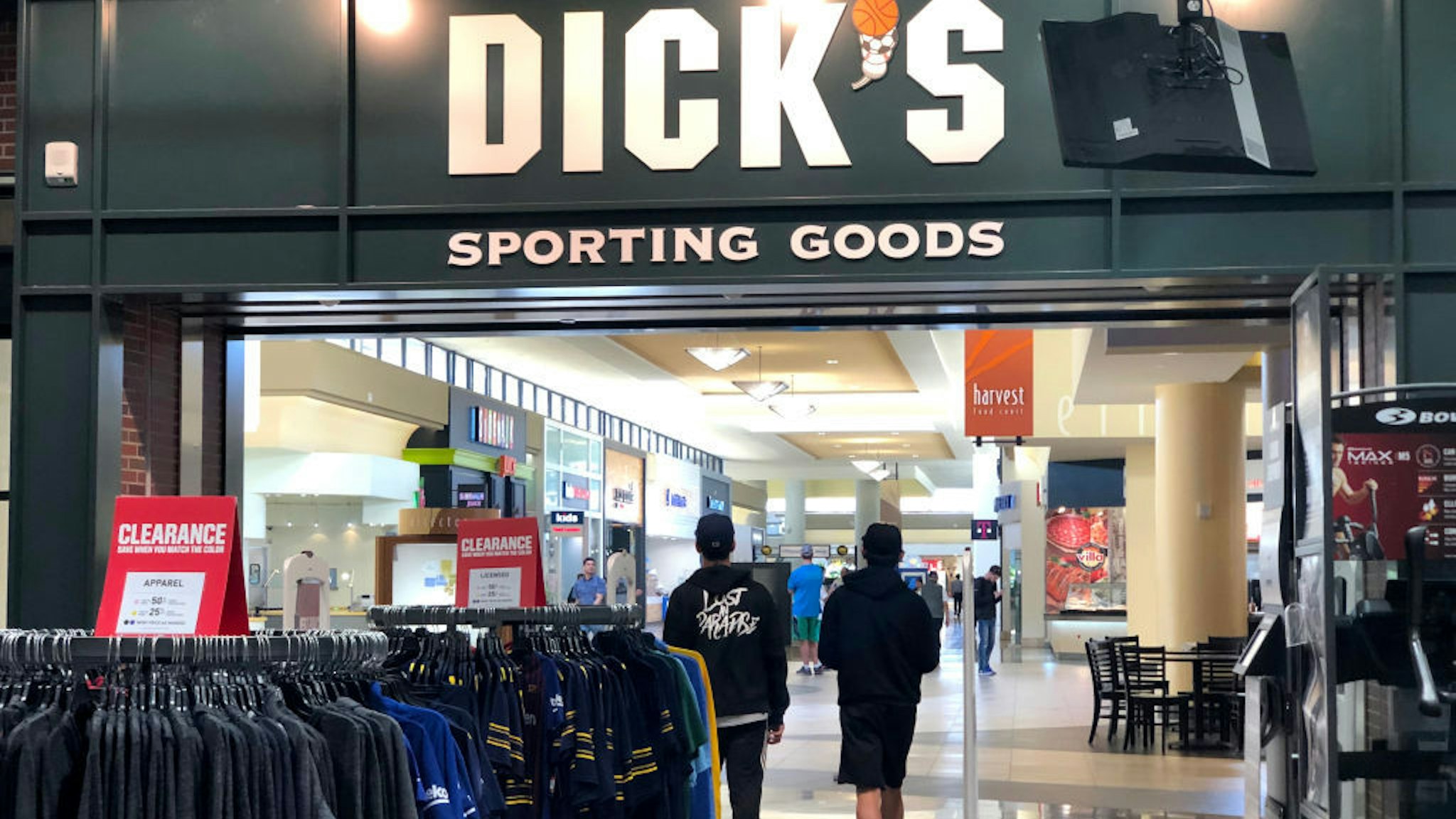 Customers leave a Dick's Sporting Goods store on May 29, 2019 in Daly City, California. Shares of Dick's Sporting Goods stock surged on Wednesday after the company reported better-than-expected first quarter earnings and raised its full year outlook. The sporting goods retailer announced that it expects to earn from $3.20 to $3.40 a share, compared to its estimate of $3.15 to $3.35 per share. (Photo by Justin Sullivan/Getty Images)