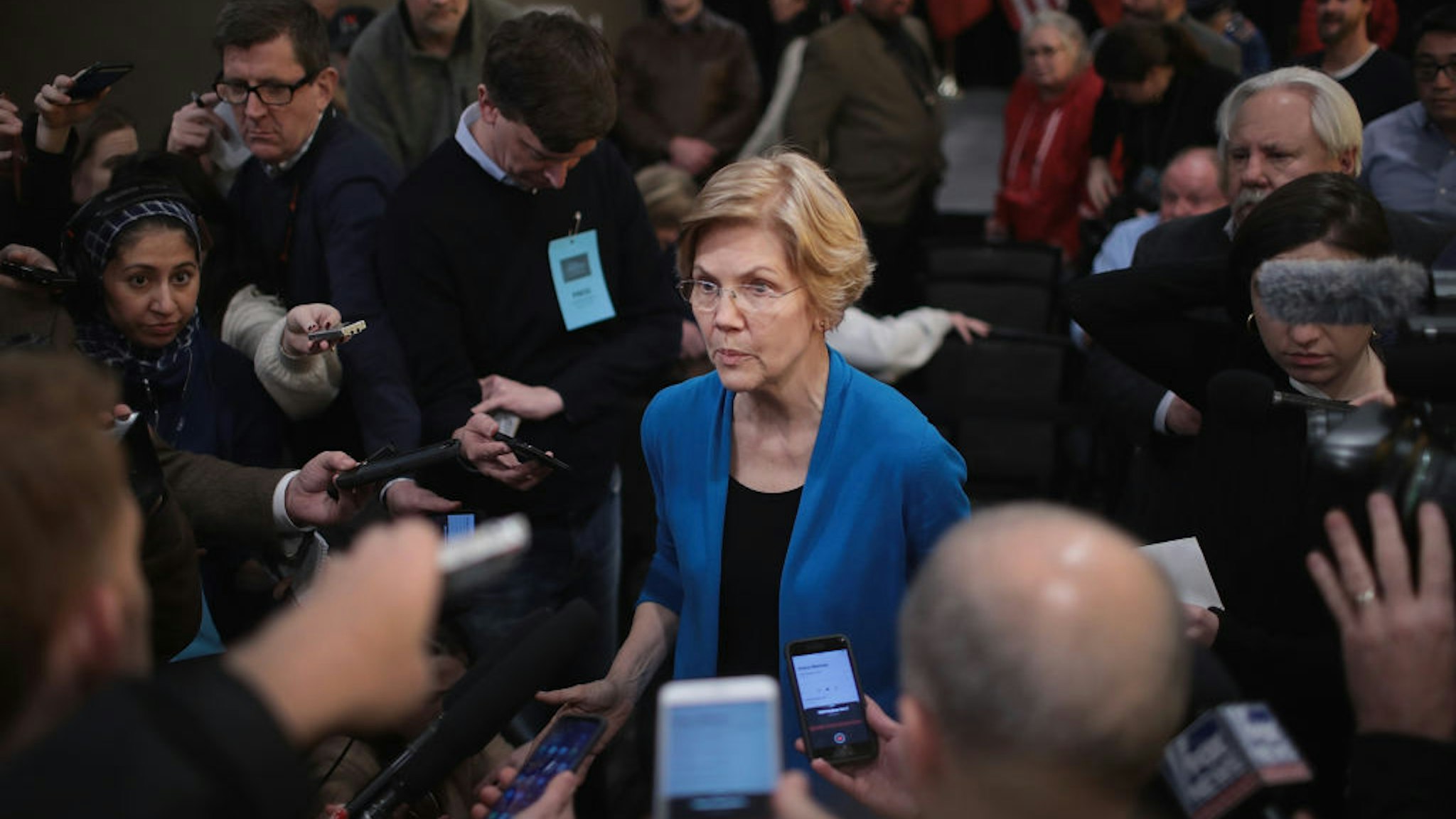 COUNCIL BLUFFS, IOWA - JANUARY 04: Sen. Elizabeth Warren (D-MA) speaks to reporters during a campaign stop at McCoy's Bar Patio and Grill on January 4, 2019 in Council Bluffs, Iowa. Warren announced on December 31 that she was forming an exploratory committee for the 2020 presidential race.