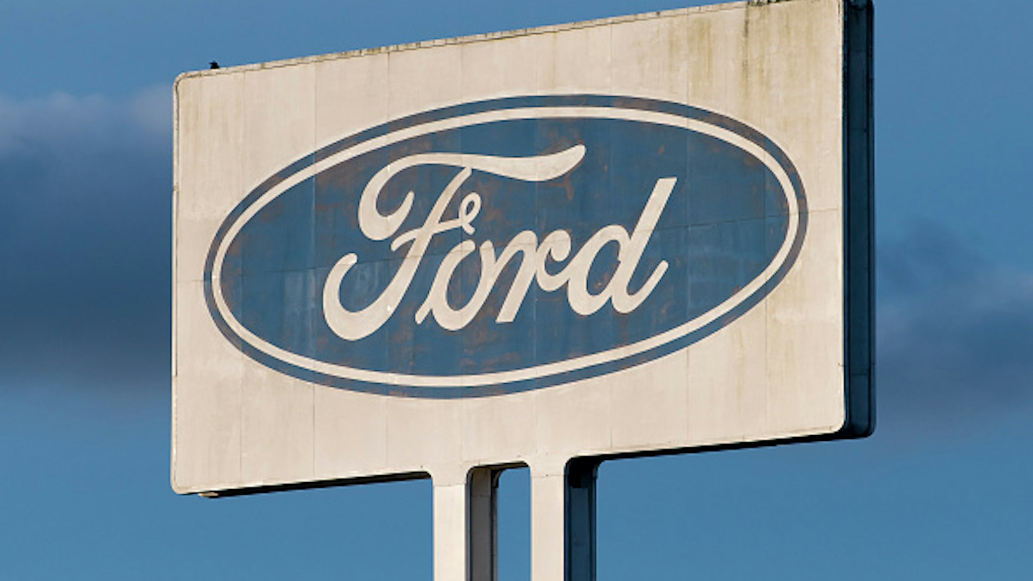 BRIDGEND, WALES - JUNE 05: A close-up of the Bridgend Ford Engine plant sign on June 5, 2019 in Bridgend, Wales. Union sources have said the engine plant in Bridgend will close in September 2020. The British car industry is facing a series of difficulties including a fall in demand for diesel vehicles and a deteriorating sales trend in the Far East.