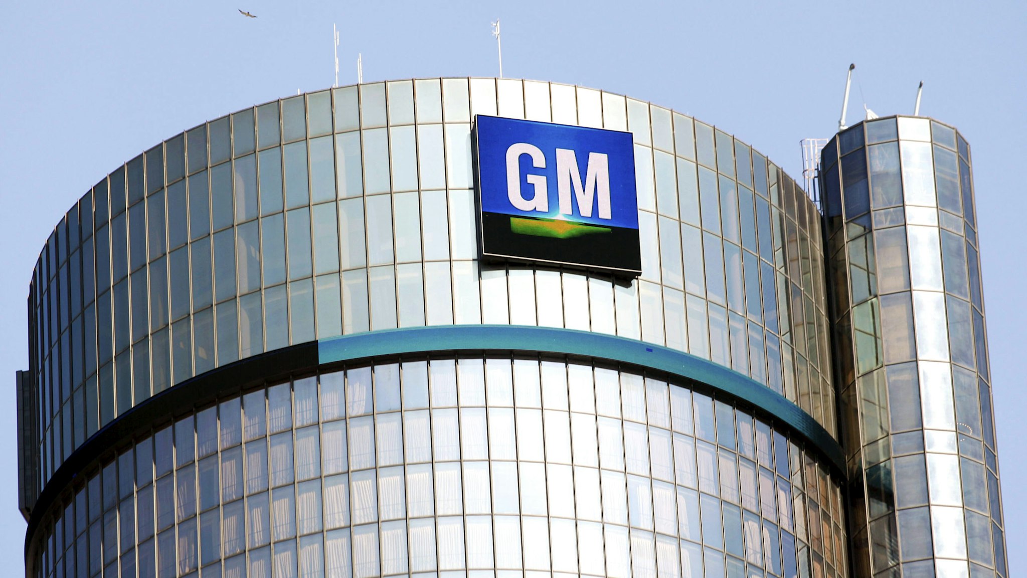 DETROIT, MI - SEPTEMBER 17: The General Motors logo on the world headquarters building is shown September 17, 2015 in Detroit, Michigan. Mary Barra, Chief Executive Officer of General Motors, and Mark Reuss, President of GM North America, held an Employee Town Hall Meeting and a question &amp; answer session with the news media today to discuss GM's $900 million settlement with the Justice Department over GM's ignition switch recalls.