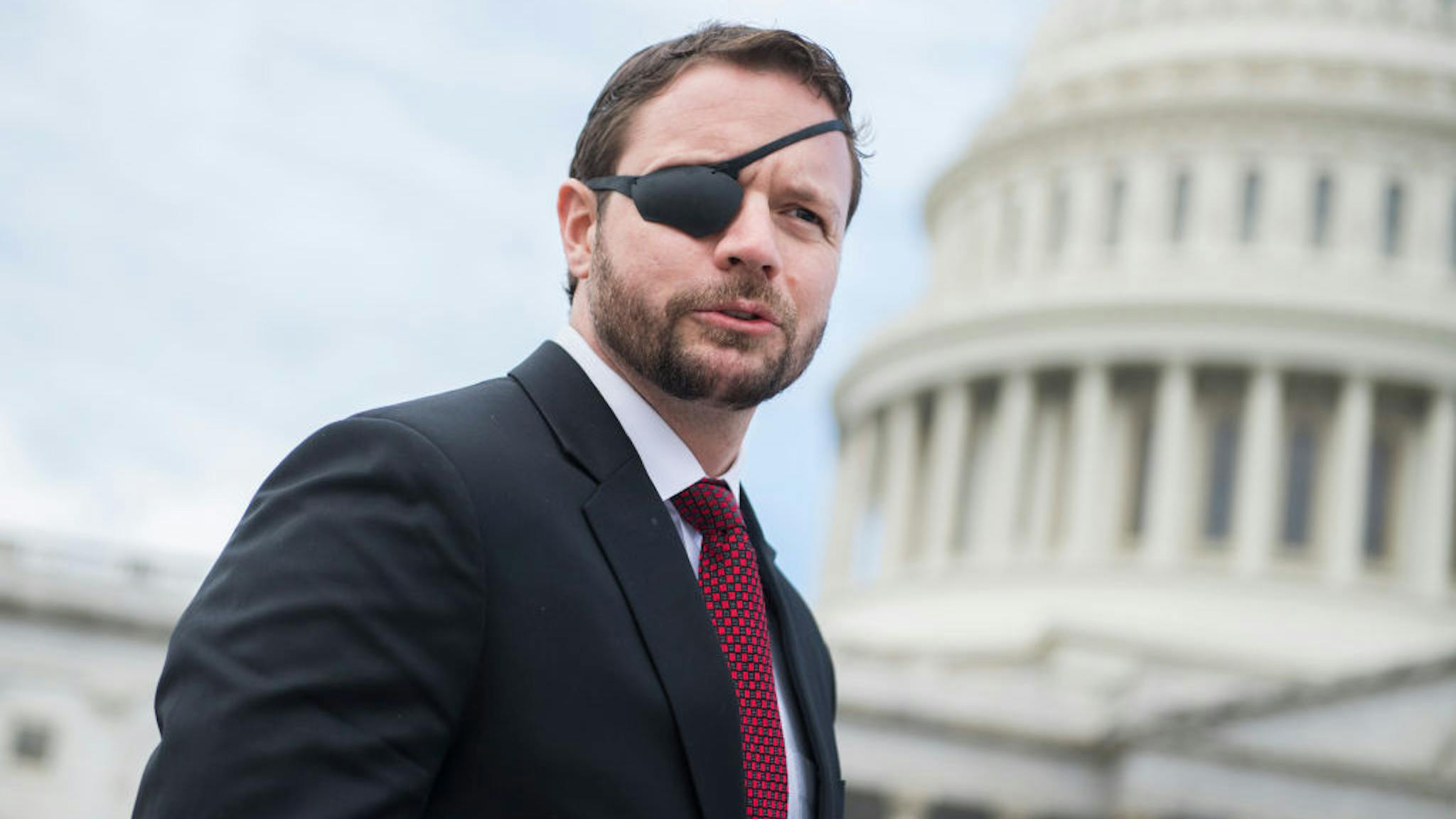 Freshman Class Photo Rep.-elect Dan Crenshaw, R-Texas, is seen after the freshman class photo on the East Front of the Capitol on November 14, 2018.