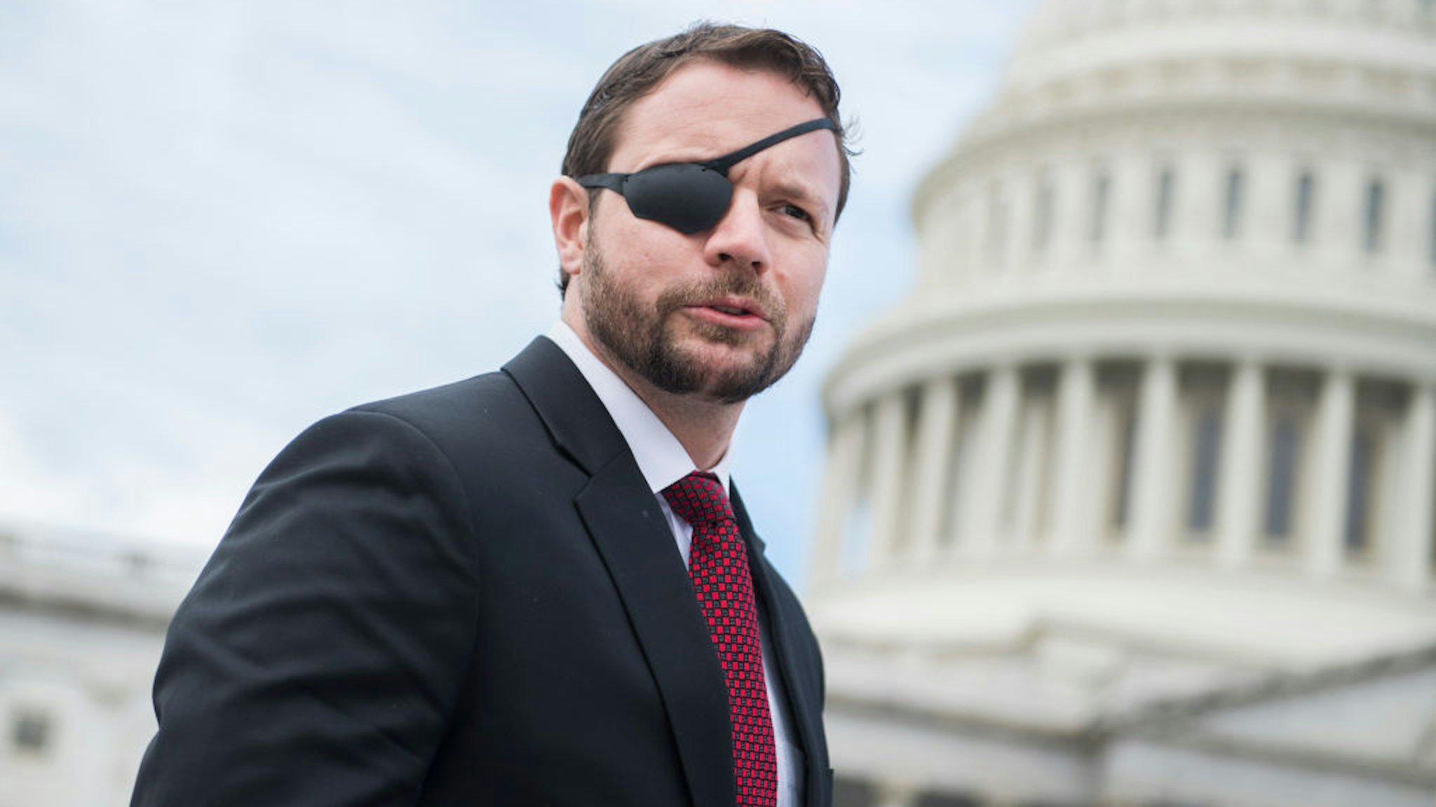 Rep.-elect Dan Crenshaw, R-Texas, is seen after the freshman class photo on the East Front of the Capitol on November 14, 2018.