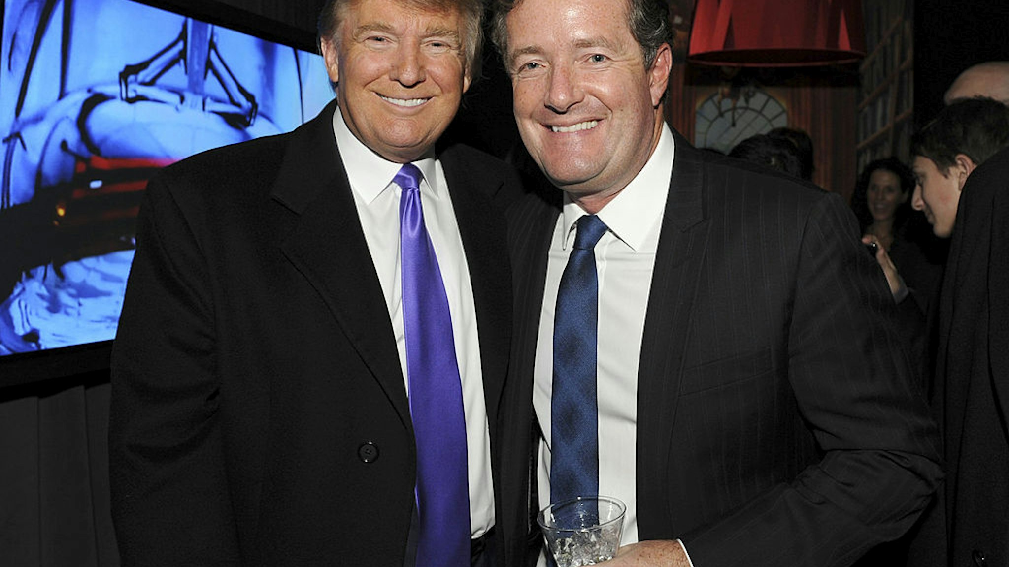 Television Personality Donald Trump and journalist Piers Morgan attend the celebration of Perfumania and Kim Kardashian�s appearance on NBC�s "The Apprentice" at the Provocateur at The Hotel Gansevoort on November 10, 2010 in New York, New York.