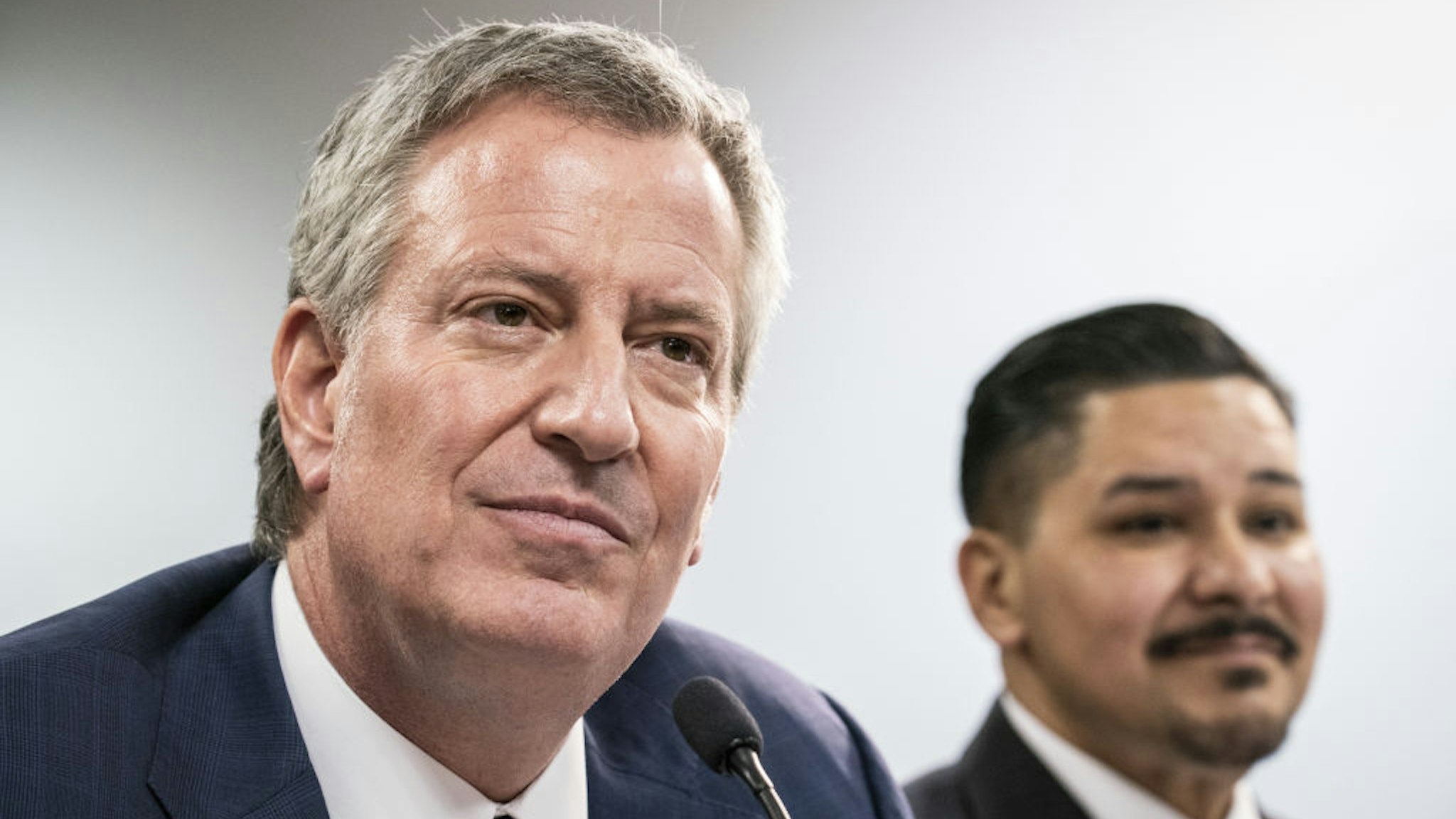 Bill de Blasio, mayor of New York, left, and Richard Carranza, chancellor of the New York City Department of Education, listen during a public hearing on school governance and mayoral control in New York, U.S., on Friday, March 15, 2019.