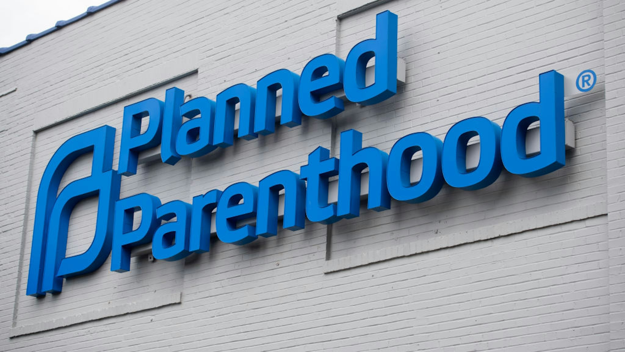 The logo of Planned Parenthood is seen outside the Planned Parenthood Reproductive Health Services Center in St. Louis, Missouri, May 30, 2019