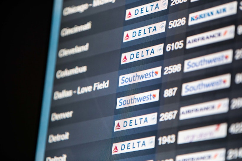 Southwest Airlines Co. flight information is displayed on a screen at Logan International Airport (BOS) in Boston, Massachusetts, U.S., on Friday, July 19, 2019. Southwest Airlines is scheduled to release earnings figures on July 25. Photographer: Scott Eisen/Bloomberg via Getty Images