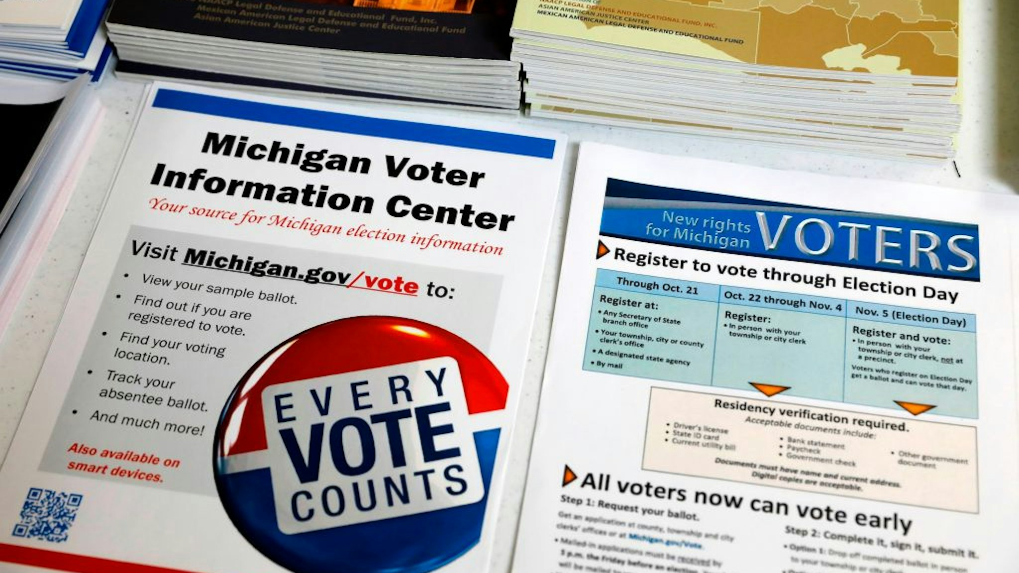 Voting literature is placed on the table at the NAACP office in Detroit, Michigan, on October 23, 2019.
