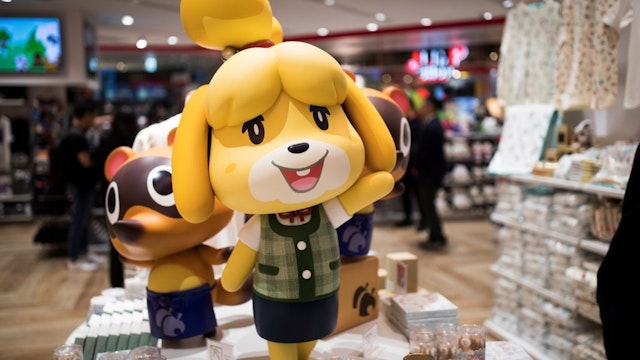 Goods of Nintendo game character Isabelle, known as Shizue in Japan, from the Animal Crossing series of video games are displayed at a new Nintendo store during a press preview in Tokyo on November 19, 2019.