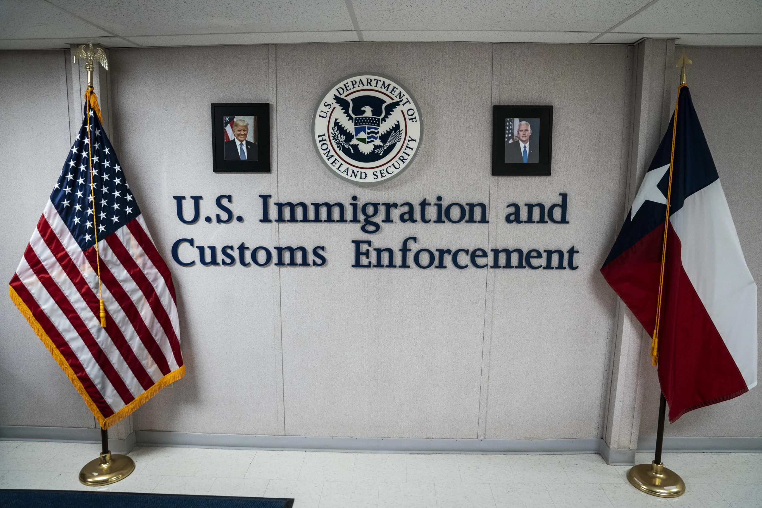 DILLEY, TX - AUGUST 23 : Portraits of President Donald J. Trump and Vice President Mike Pence are seen as U.S. Immigration and Customs Enforcement (ICE) and Enforcement and Removal Operations (ERO) hosts a media tour at the South Texas Family Residential Center, which houses families who are pending disposition of their immigration cases on Friday, Aug 23, 2019 in Dilley, TX. (Photo by Jabin Botsford/The Washington Post via Getty Images)