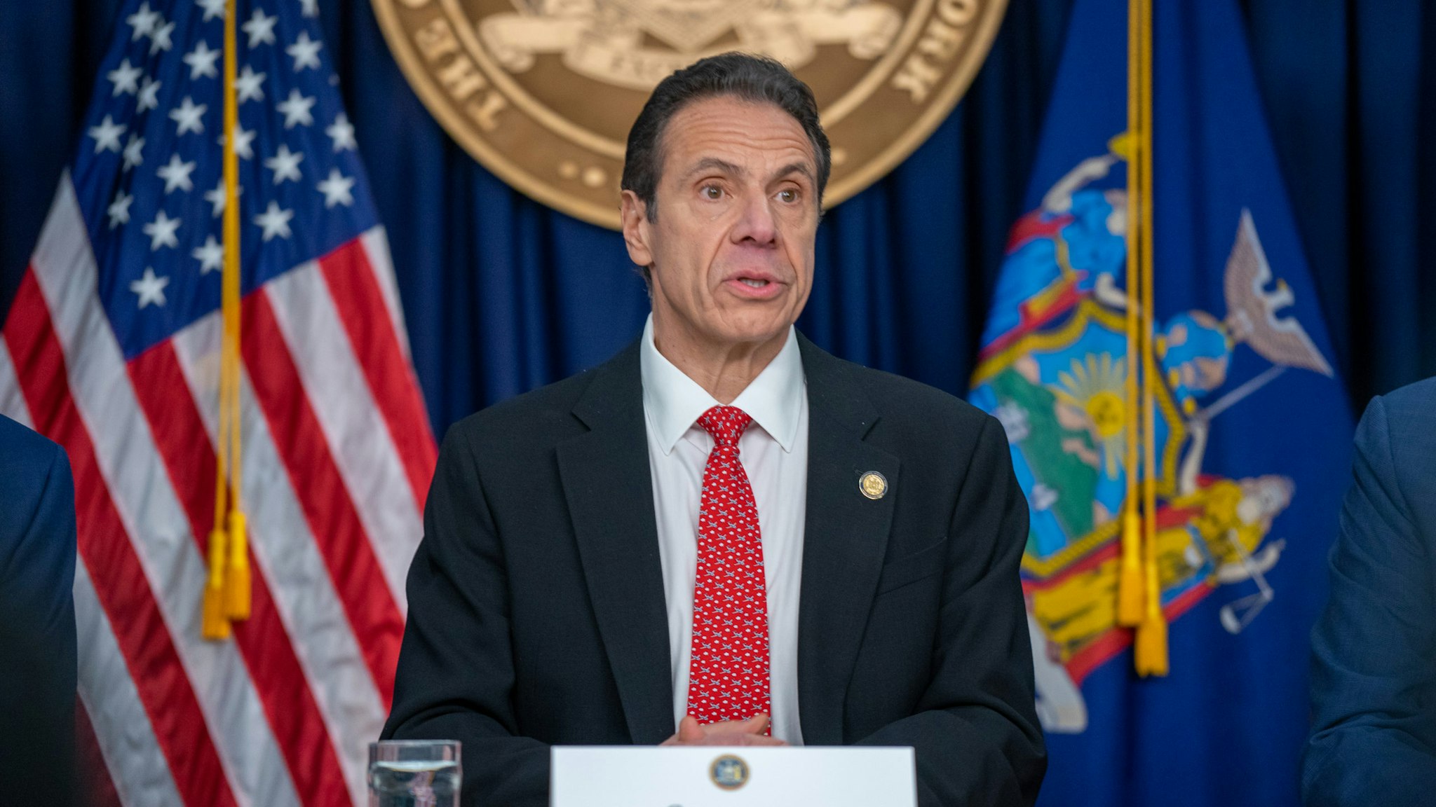 NEW YORK, NY - MARCH 2: New York state Gov. Andrew Cuomo speaks during a news conference on the first confirmed case of COVID-19 in New York on March 2, 2020 in New York City. A female health worker in her 30s who had traveled in Iran contracted the virus and is now isolated at home with symptoms of COVID-19, but is not in serious condition. Cuomo said in a statement that the patient "has been in a controlled situation since arriving to New York." (Photo by David Dee Delgado/Getty Images)