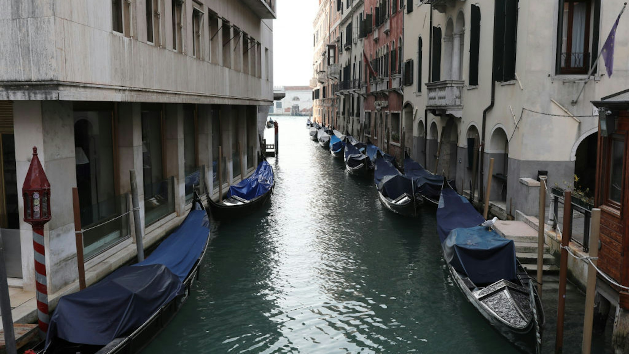 A completely empty canal with unused Gondole is seen on March 9, 2020 in Venice, Italy. Prime Minister Giuseppe Conte announced a "national emergency" due to the coronavirus outbreak and imposed quarantines on the Lombardy and Veneto regions, which contain roughly a quarter of the country's population.