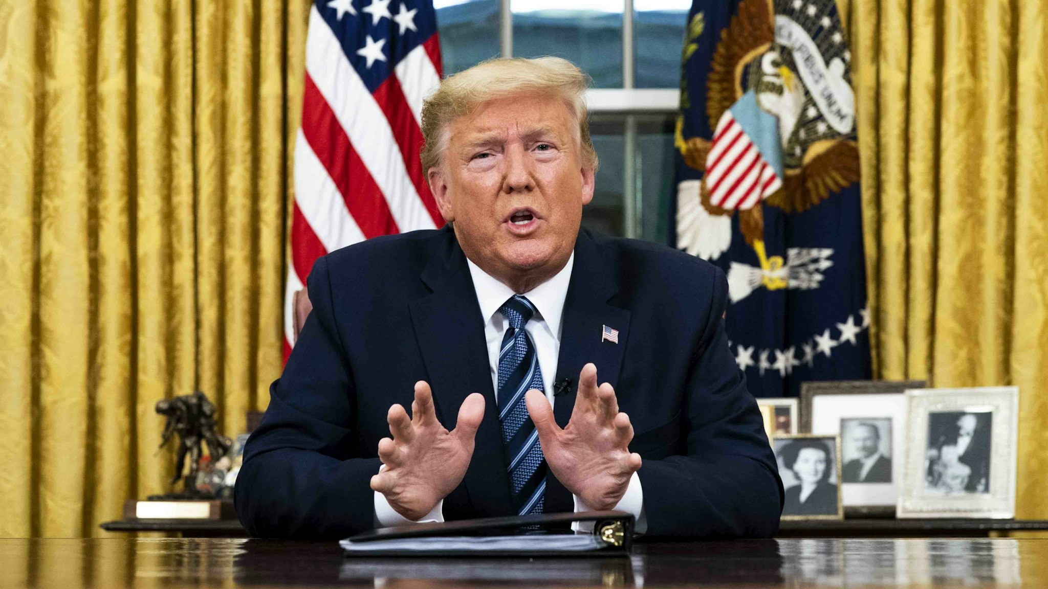WASHINGTON, DC - MARCH 11: US President Donald Trump addresses the nation from the Oval Office about the widening Coronavirus crisis on March 11, 2020 in Washington, DC. President Trump said the US will suspend all travel from Europe - except the UK - for the next 30 days. Since December 2019, Coronavirus (COVID-19) has infected more than 109,000 people and killed more than 3,800 people in 105 countries. (Photo by Doug Mills-Pool/Getty Images)