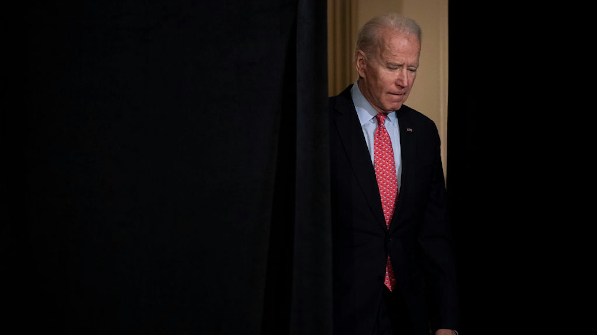 Democratic presidential candidate former Vice President Joe Biden arrives to deliver remarks about the coronavirus outbreak, at the Hotel Du Pont March 12, 2020 in Wilmington, Delaware.