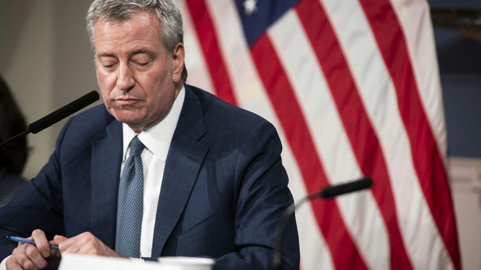 Bill de Blasio, mayor of New York, pauses while speaking during a news conference on COVID-19 in New York, U.S., on Friday, March 13, 2020. On Thursday, Mayor de Blasio declared a state of emergency for New York City, saying the city would work with the state to enforce its decree against gatherings of more than 500 people to combat the new coronavirus outbreak. Photographer: Mark Kauzlarich/Bloomberg via Getty Images