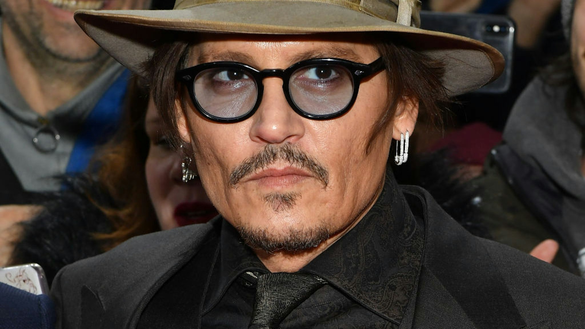 Johnny Depp poses at the "Minamata" premiere during the 70th Berlinale International Film Festival Berlin at Friedrichstadt-Palast on February 21, 2020 in Berlin, Germany.