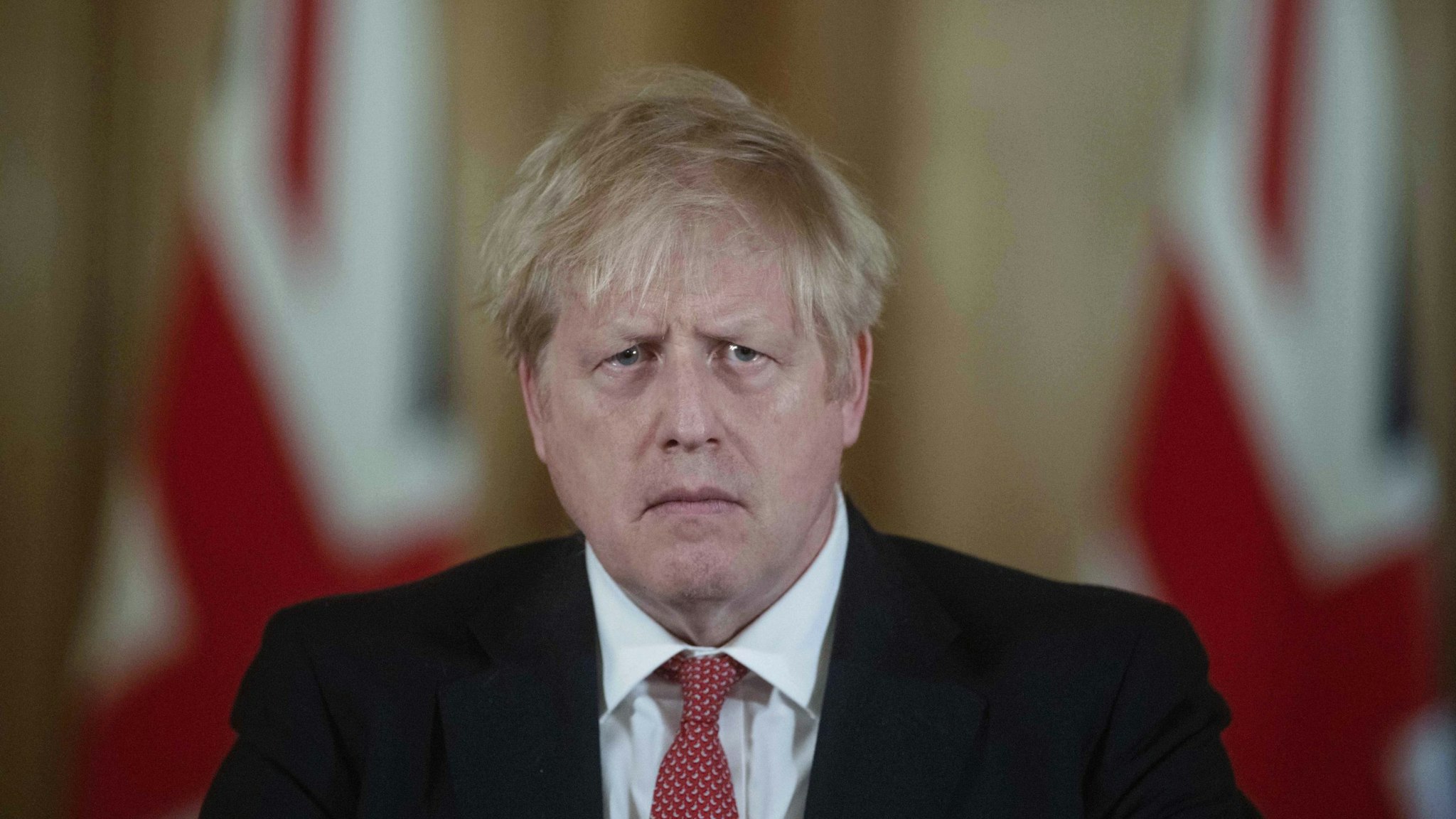 Boris Johnson, U.K. prime minister, pauses while speaking during a daily coronavirus briefing inside number 10 Downing Street in London, U.K., on Friday, March 20, 2020. Johnson ordered pubs, restaurants and leisure centers across the country to close from Friday night in a bid to slow the spread of the coronavirus pandemic. Photographer: Julian Simmonds/The Daily Telegraph/Bloomberg via Getty Images