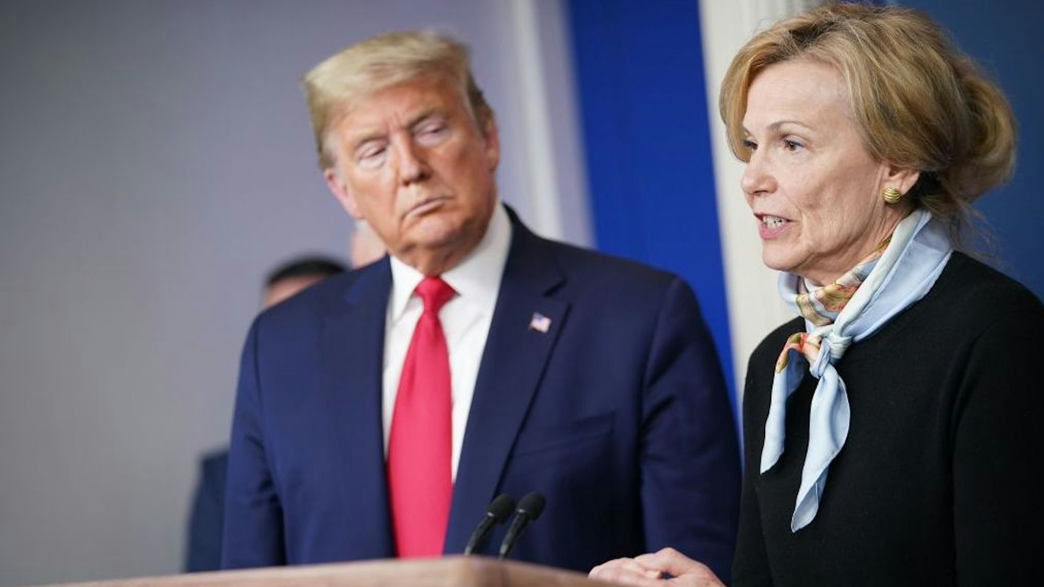 Response coordinator for White House Coronavirus Task Force Deborah Birx speaks, while US President Donald Trump listens, during the daily briefing on the novel coronavirus, COVID-19, at the White House on March 24, 2020, in Washington, DC.
