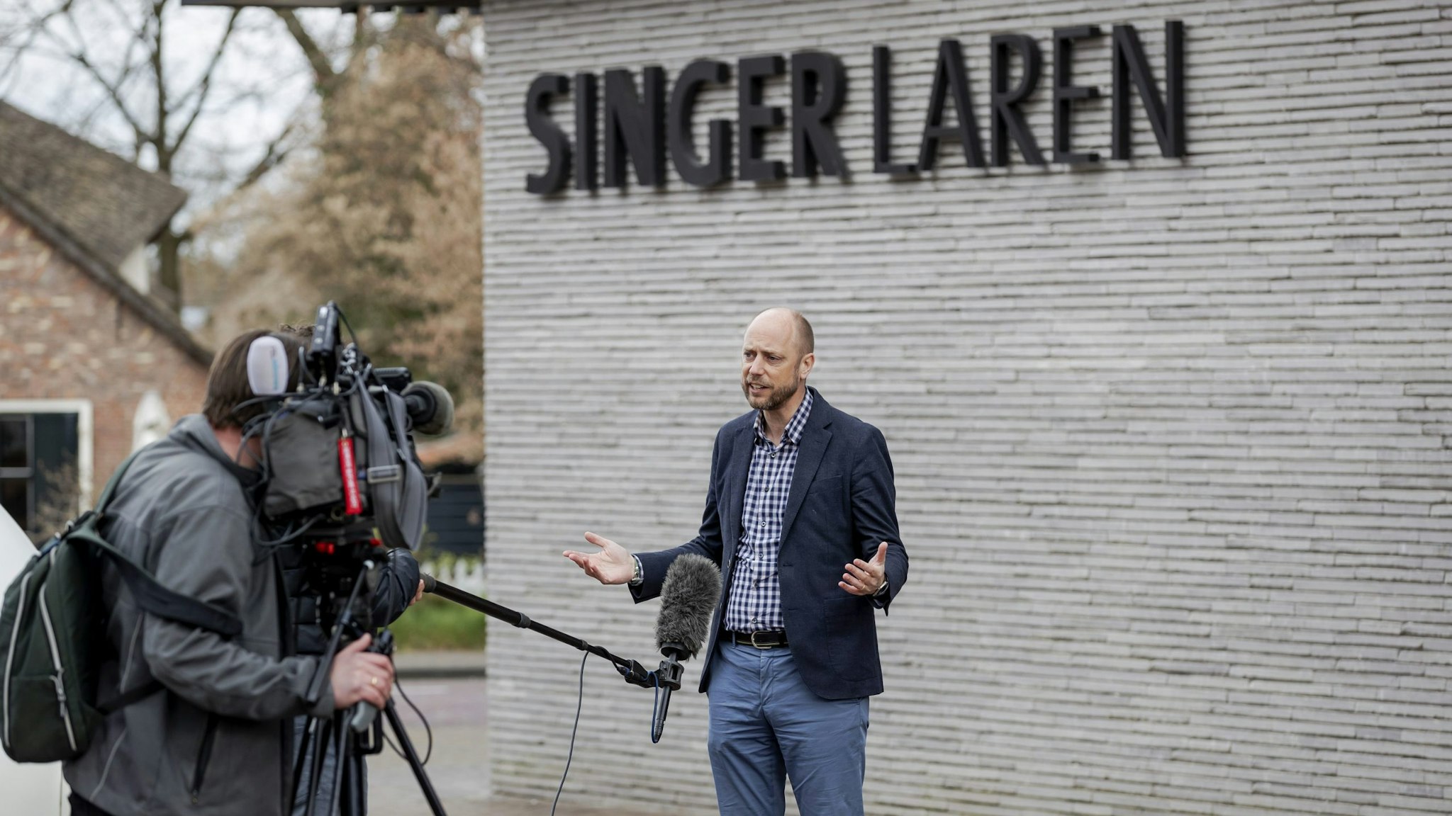 Singer Laren Museum Evert van Os speaks to the press outside the museum on March 30, 2020 in Laren, about 30 kilometres southeast of Amsterdam, closed to the public because of the COVID-19 pandemic, after th 1884 painting by Vincent van Gogh "Parsonage Garden at Neunen in Spring" was stolen. - The painting has an estimated value of between one to six million euros, local media said. The criminals entered the museum at around 3.15 am (0115 GMT) by breaking open a front glass door, police and Dutch news reports said. (Photo by Robin VAN LONKHUIJSEN / ANP / AFP) / Netherlands OUT (Photo by ROBIN VAN LONKHUIJSEN/ANP/AFP via Getty Images)