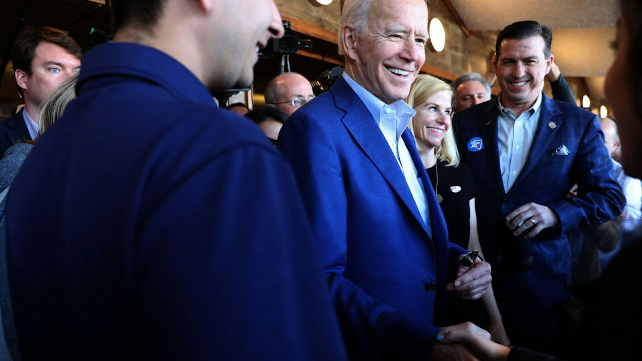Democratic presidential candidate former Vice President Joe Biden greets patron at the Buttercup diner on March 03, 2020 in Oakland, California.