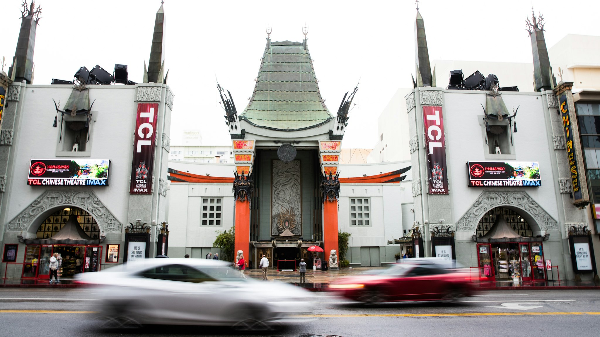 HOLLYWOOD, CALIFORNIA - MARCH 13: Visitors to the TCL Chinese Theatre are seen on March 13, 2020 in Hollywood, California. The spread of COVID-19 has negatively affected a wide range of industries all across the global economy. (Photo by Rich Fury/Getty Images)