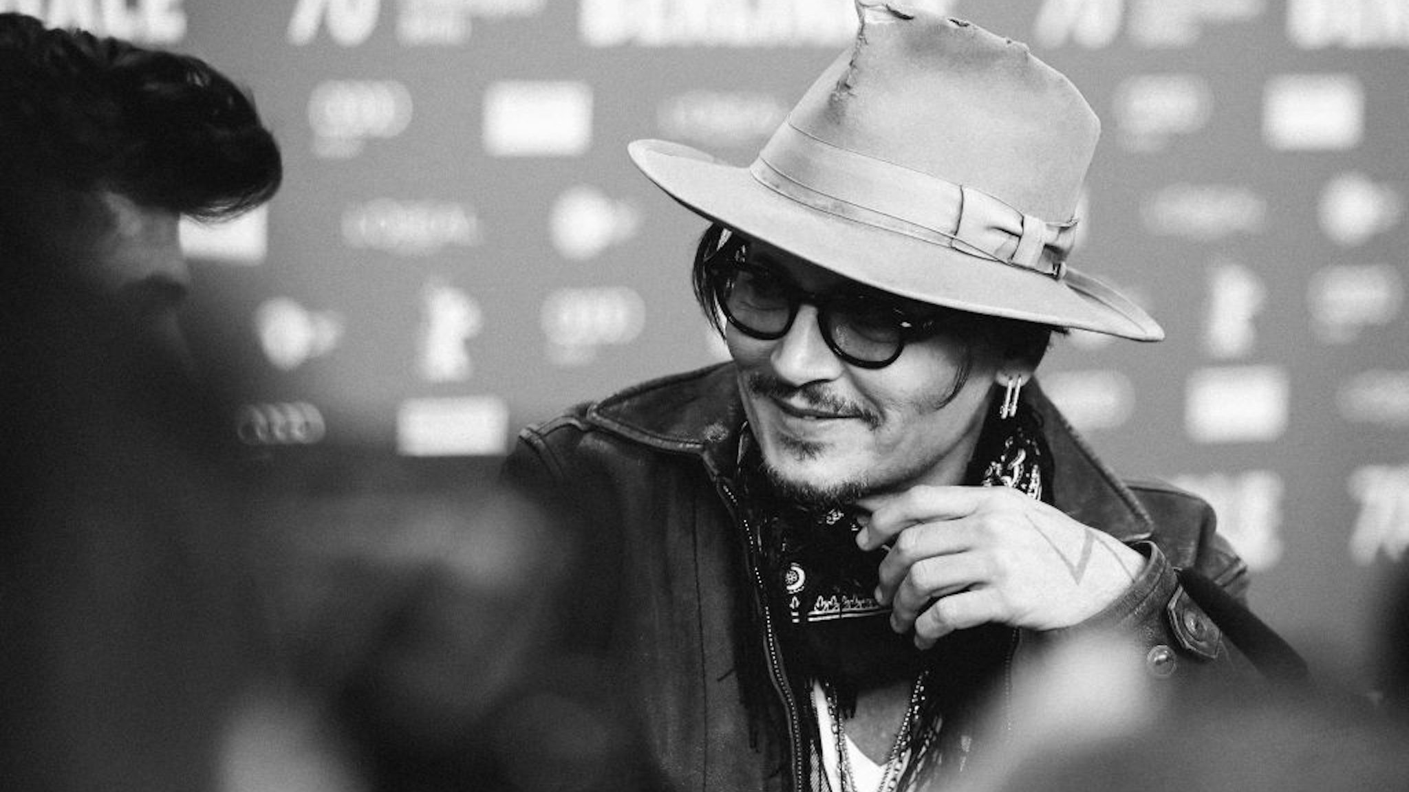 Johnny Depp speaks at the "Minamata" press conference during the 70th Berlinale International Film Festival Berlin at Grand Hyatt Hotel on February 21, 2020 in Berlin, Germany.