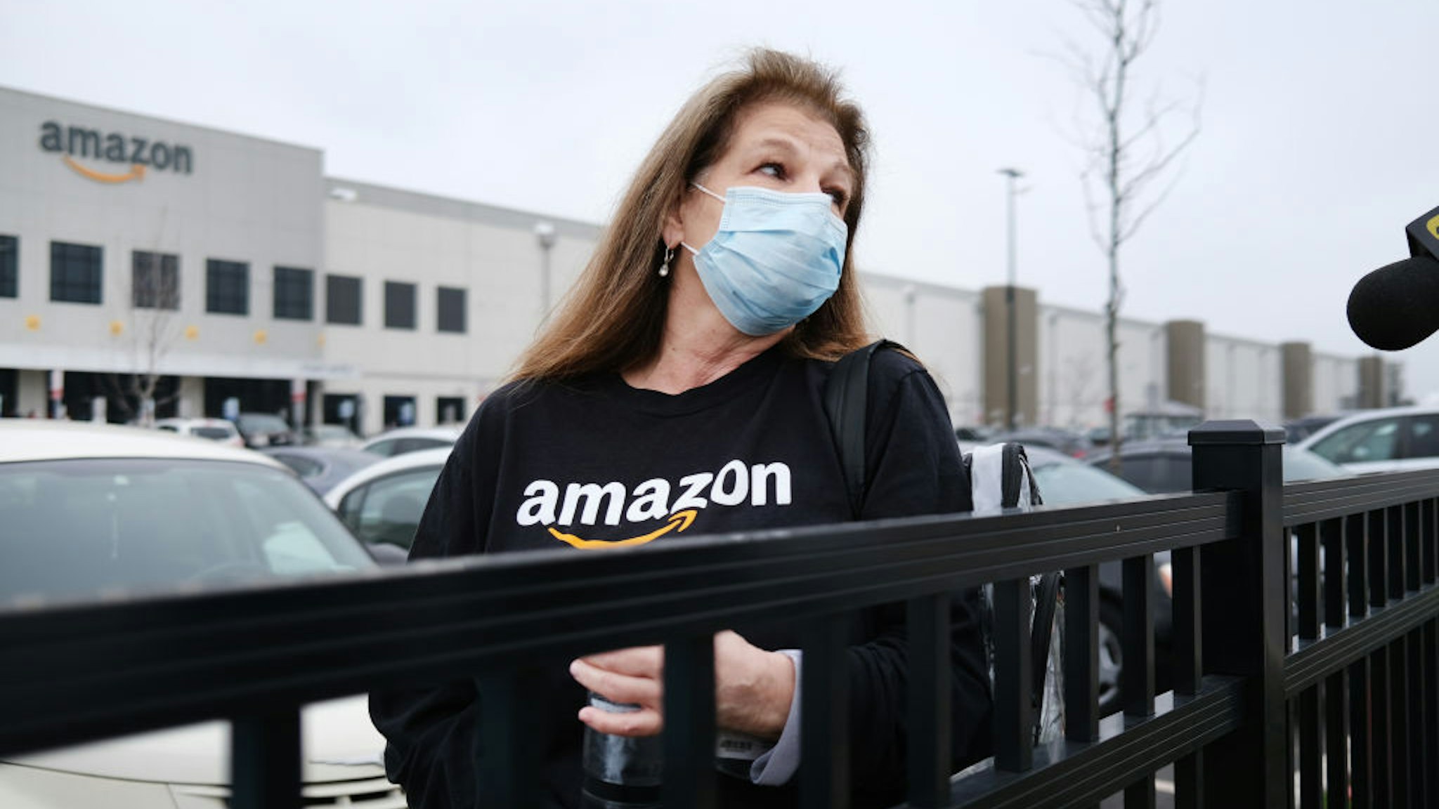 Amazon employees hold a protest and walkout over conditions at the company's Staten Island distribution facility on March 30, 2020 in New York City.