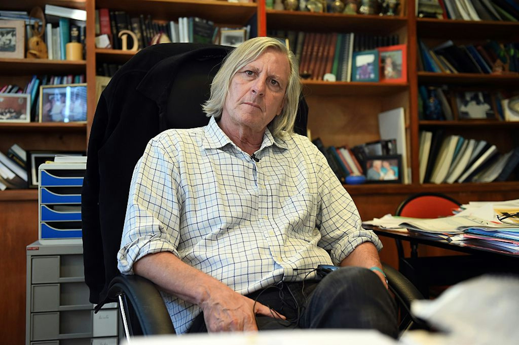 Didier Raoult, Professor at the Faculty of Medicine of Marseille, poses on November 6, 2014 in his office at the Facutly of Medicine in Marseille, southern France.
