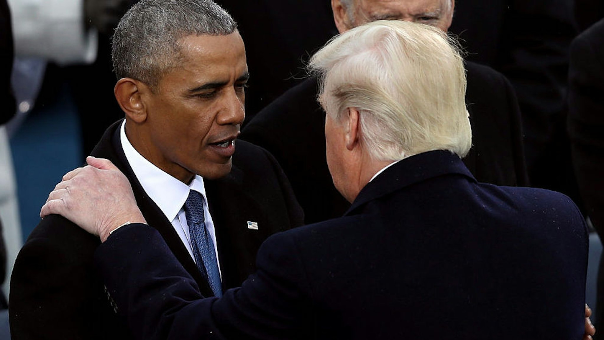 Former president Barack Obama greets President Donald Trump after his inauguration on the West Front of the U.S. Capitol on January 20, 2017 in Washington, DC.