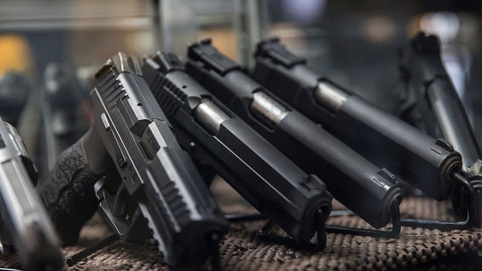 Blue Ridge Arsenal Gun Store WASHINGTON, USA - JANUARY 9: Assorted pistols on display that customers can rent to use on the range at Blue Ridge Arsenal in Chantilly, Va., USA on January 9, 2015.