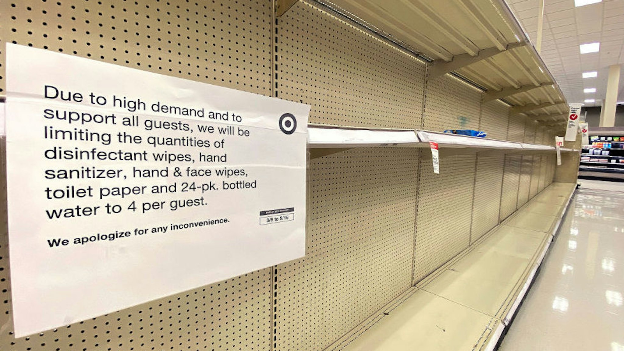 ARLINGTON, VIRGINIA - MARCH 13: Shelves normally stocked with hand wipes, hand sanitizer and toilet paper sit empty at a Target store as people stockpile supplies due to the outbreak of the coronavirus (COVID-19) March 13, 2020 in Arlington, Virginia. The U.S. government is racing to make more coronavirus test kits available as schools close around the country, sporting events are canceled, and businesses encourage workers to telecommute where possible.