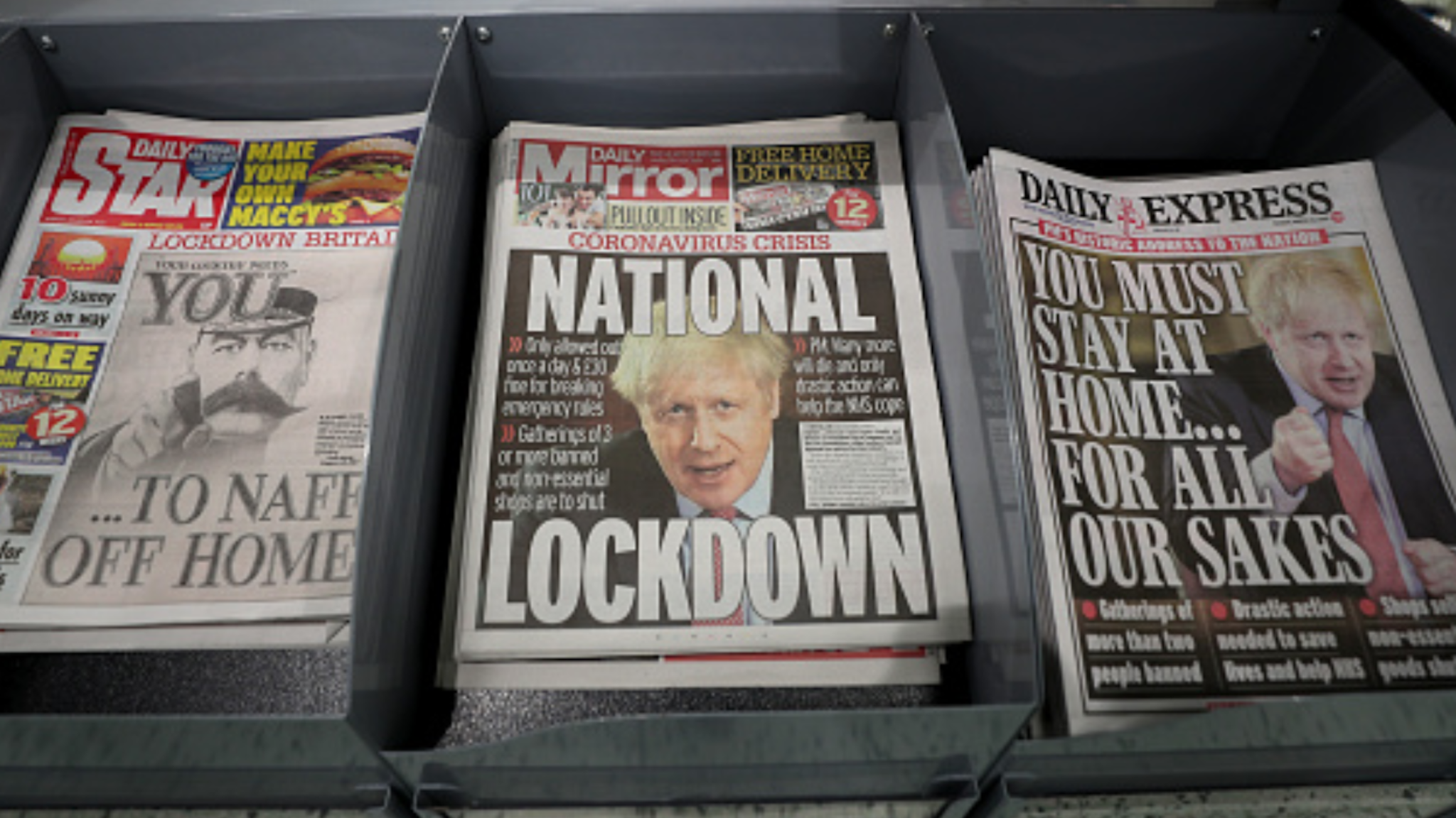 Today's newspapers displayed at a local shop in Malvern, the day after Prime Minister Boris Johnson put the UK in lockdown to help curb the spread of the coronavirus.
