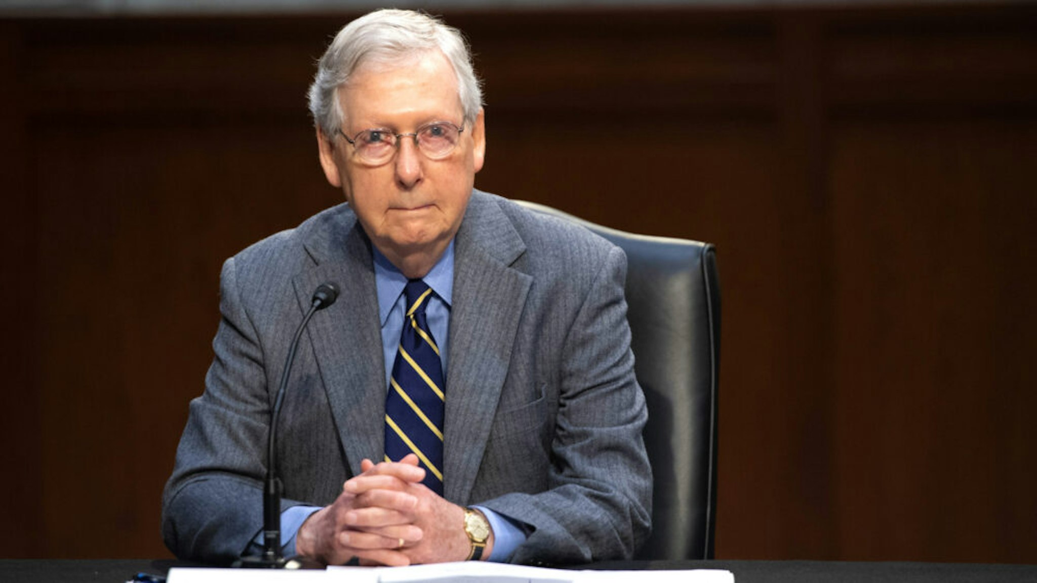 US Senate Majority Leader Mitch McConnell attends a meeting to discuss a potential economic bill in response to the coronavirus, COVID-19, in Washington, DC, on March 20, 2019. - McConnell unveiled on March 19, an economic rescue plan to send $1,200 direct checks to taxpayers, $300 billion for small businesses to keep idled workers on payroll and $208 billion in loans to airlines and other industries.