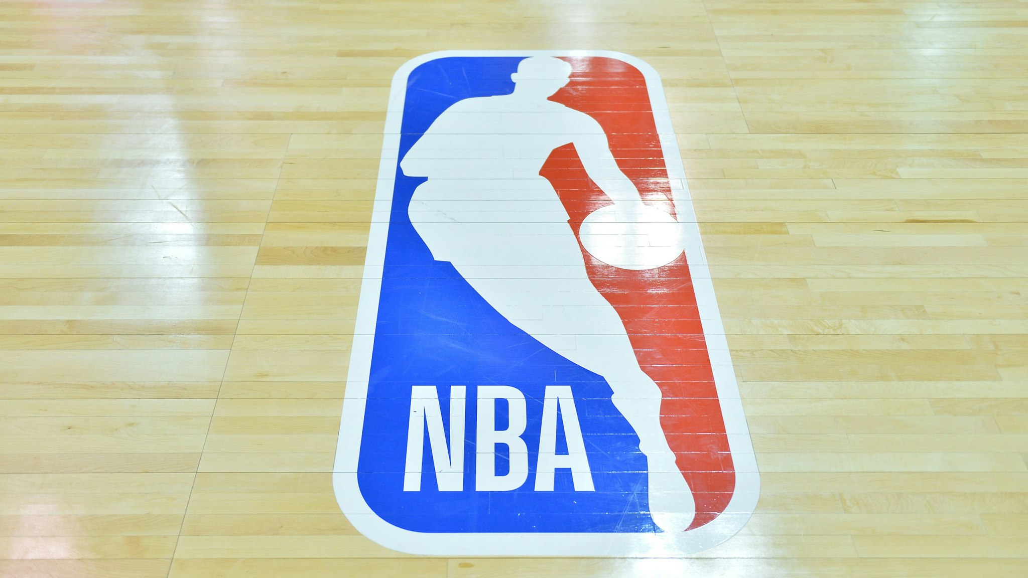 LAS VEGAS, NV - JULY 09: A general view of the court shows the NBA logo during a game between the Sacramento Kings and the Memphis Grizzlies during the 2017 NBA Summer League at the Cox Pavilion on July 9, 2017 in Las Vegas, Nevada. The NBA unveiled a refreshed logo during the 2017 Las Vegas Summer League. A modified version of Action font, customized for the league, will be used for the letters N-B-A in the primary logo.
