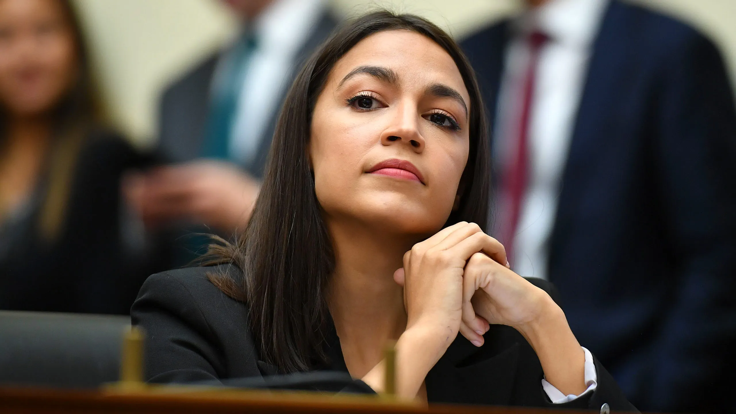 Rep. Alexandria Ocasio-Cortez(D-NY) listens as Facebook Chairman and CEO Mark Zuckerberg testifies before the House Financial Services Committee on "An Examination of Facebook and Its Impact on the Financial Services and Housing Sectors" in the Rayburn House Office Building in Washington, DC on October 23, 2019.