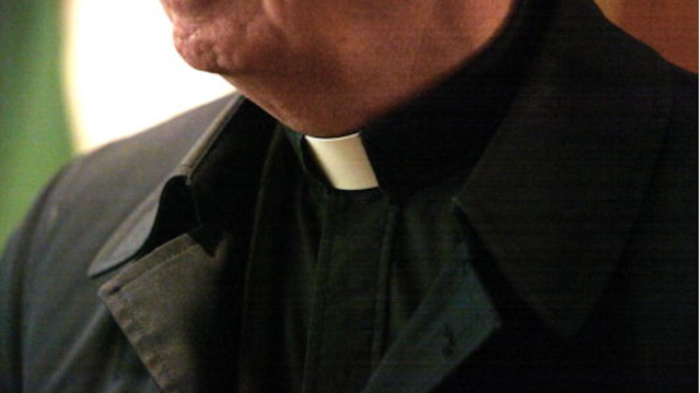 403101 05: The collar of a priest is seen at St. Adalbert Catholic Church March 29, 2002 in Chicago, IL. Good Friday's "Way of the Cross" services is celebrated by Roman Catholics all over the world.