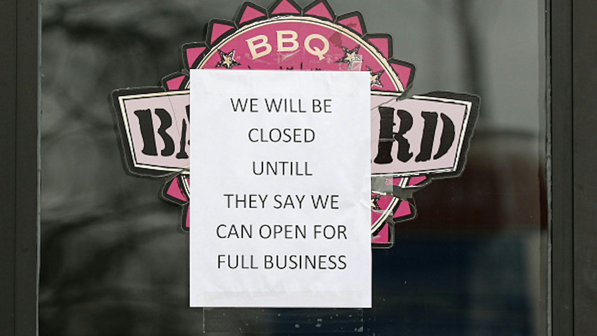 TOLEDO, OH - MARCH 24: A sign stating that a restaurant is closed is seen during the stay-at-home order issued by Ohio Gov. Mike DeWine during the coronavirus COVID-19 outbreak on March 24, 2020 in Toledo, Ohio.